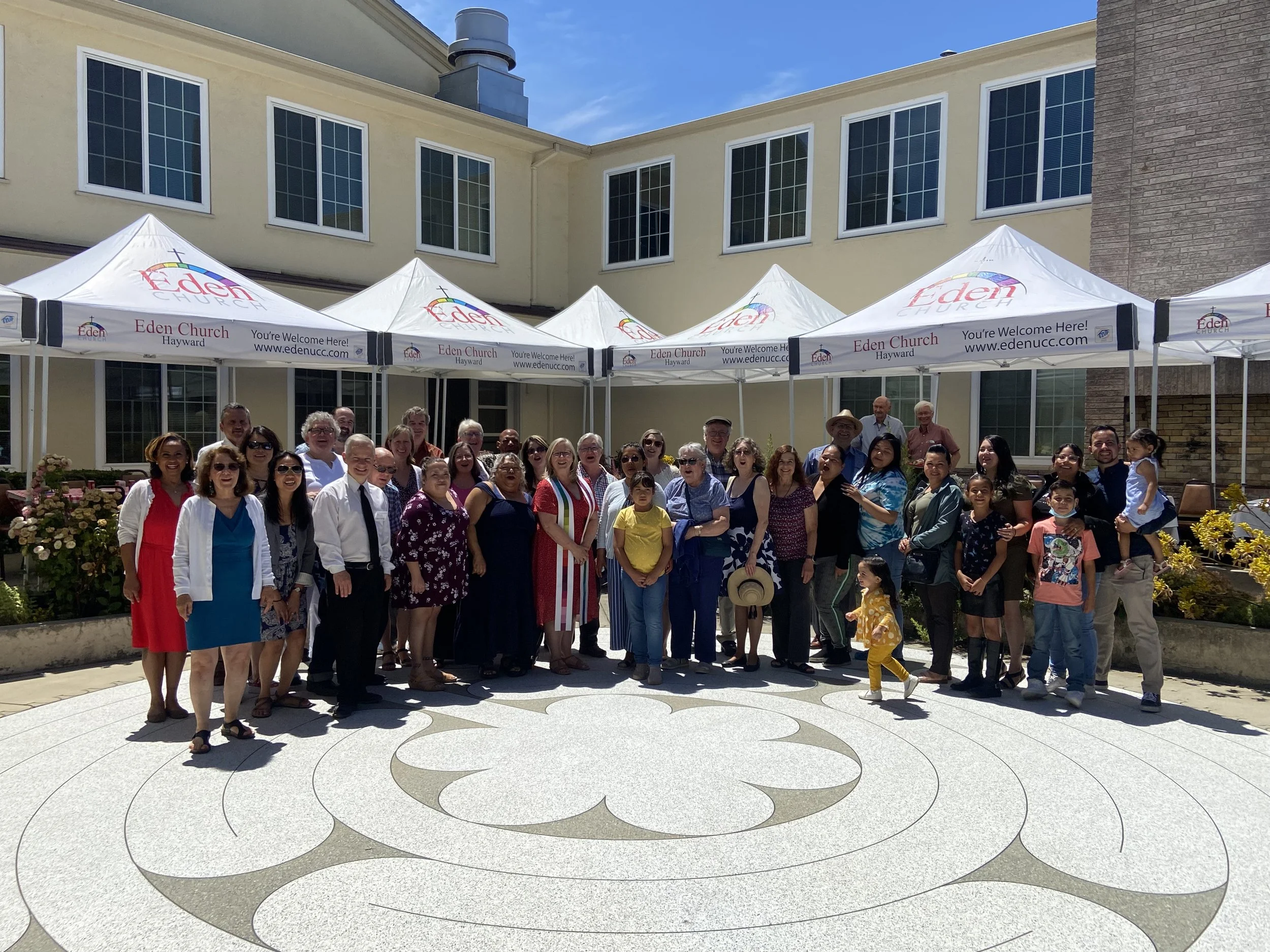 Eden community members gathering outside