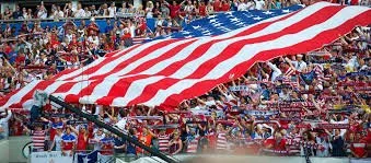 USA football fans at the 2026 FIFA World Cup, capturing the emotional intensity of the tournament explored by sport psychologist and former professional footballer Kevin George