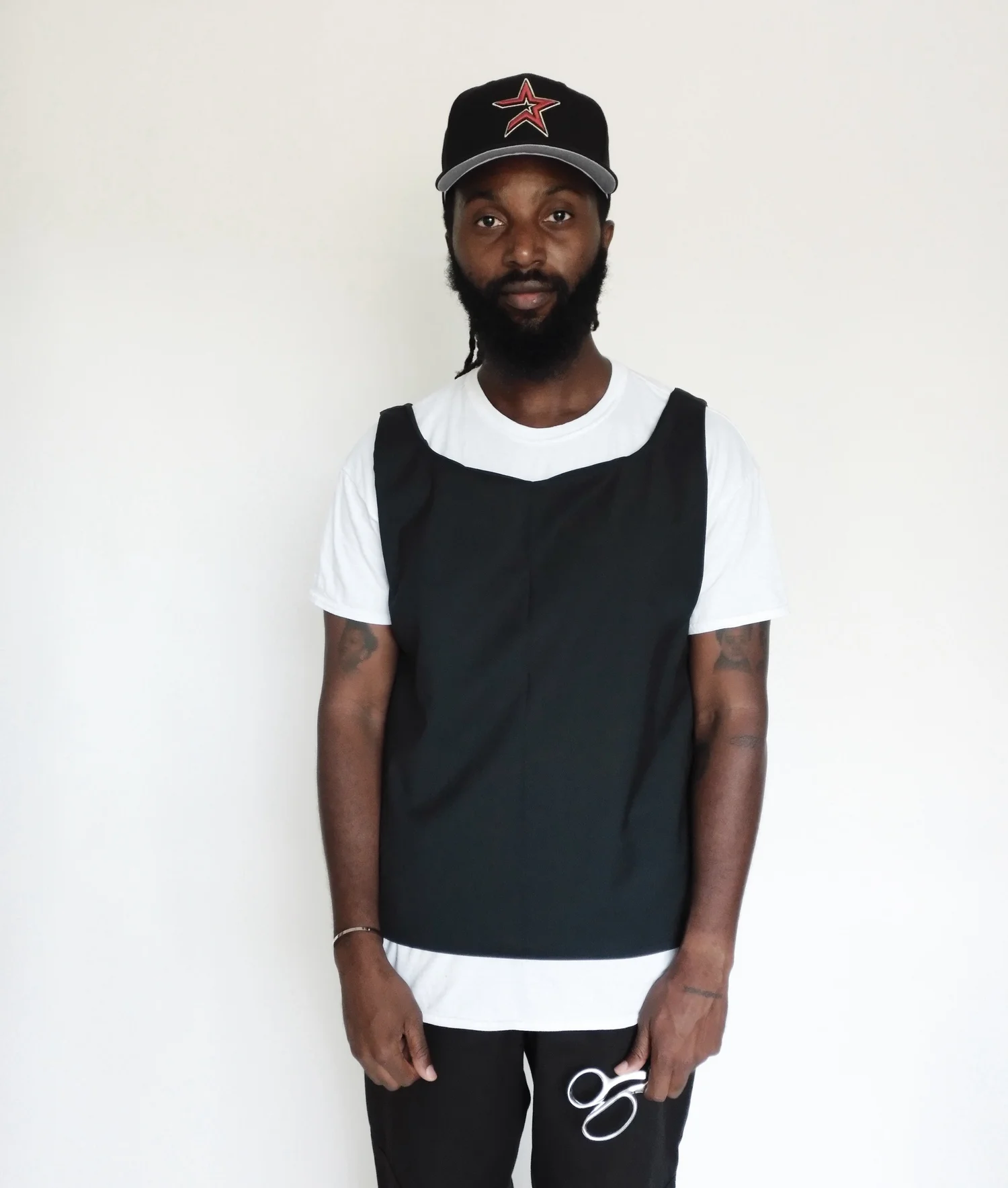 1 of 1 Black Drop Shoulder Vest — OWV