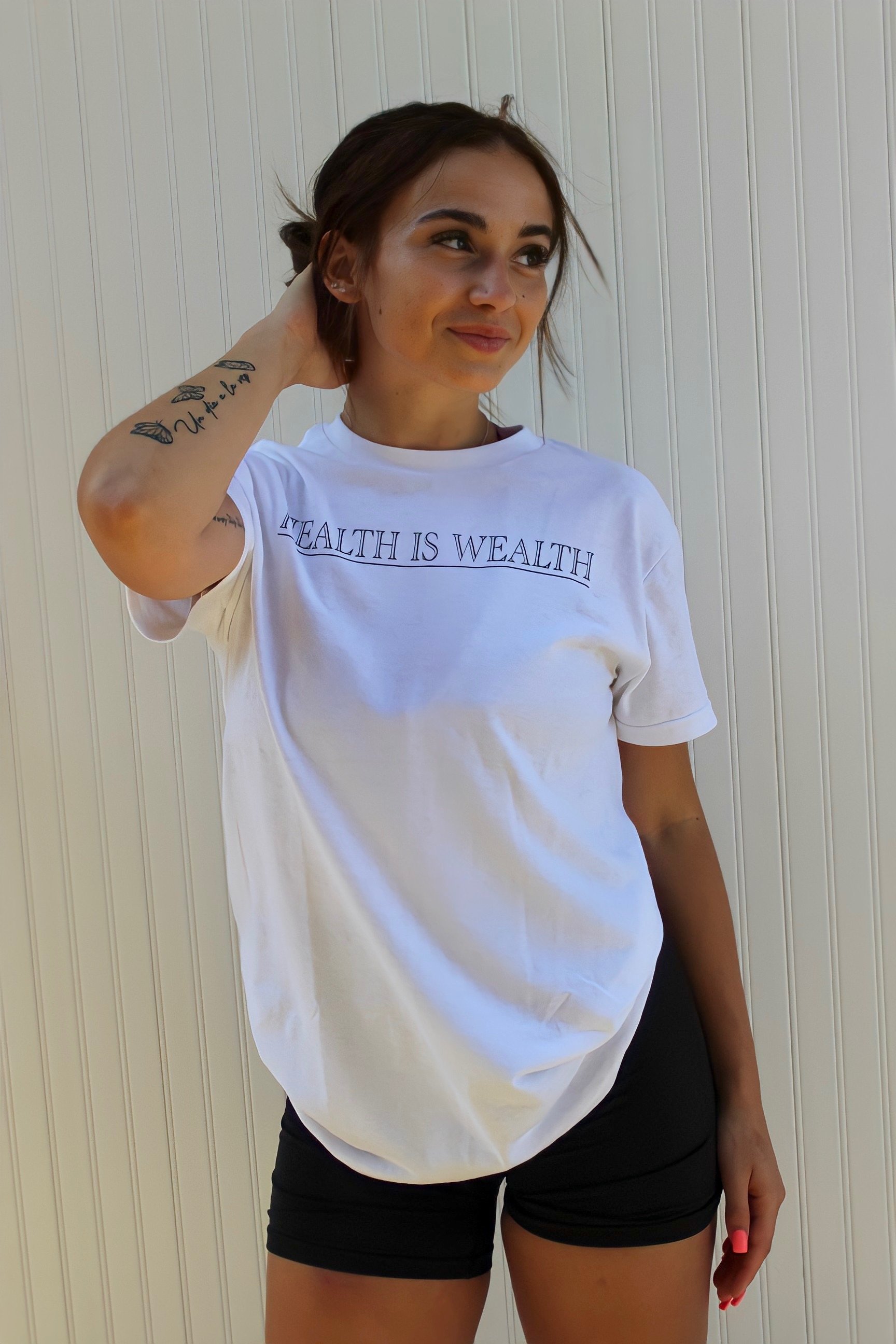 Embroidered "Health Is Wealth"  T-Shirt