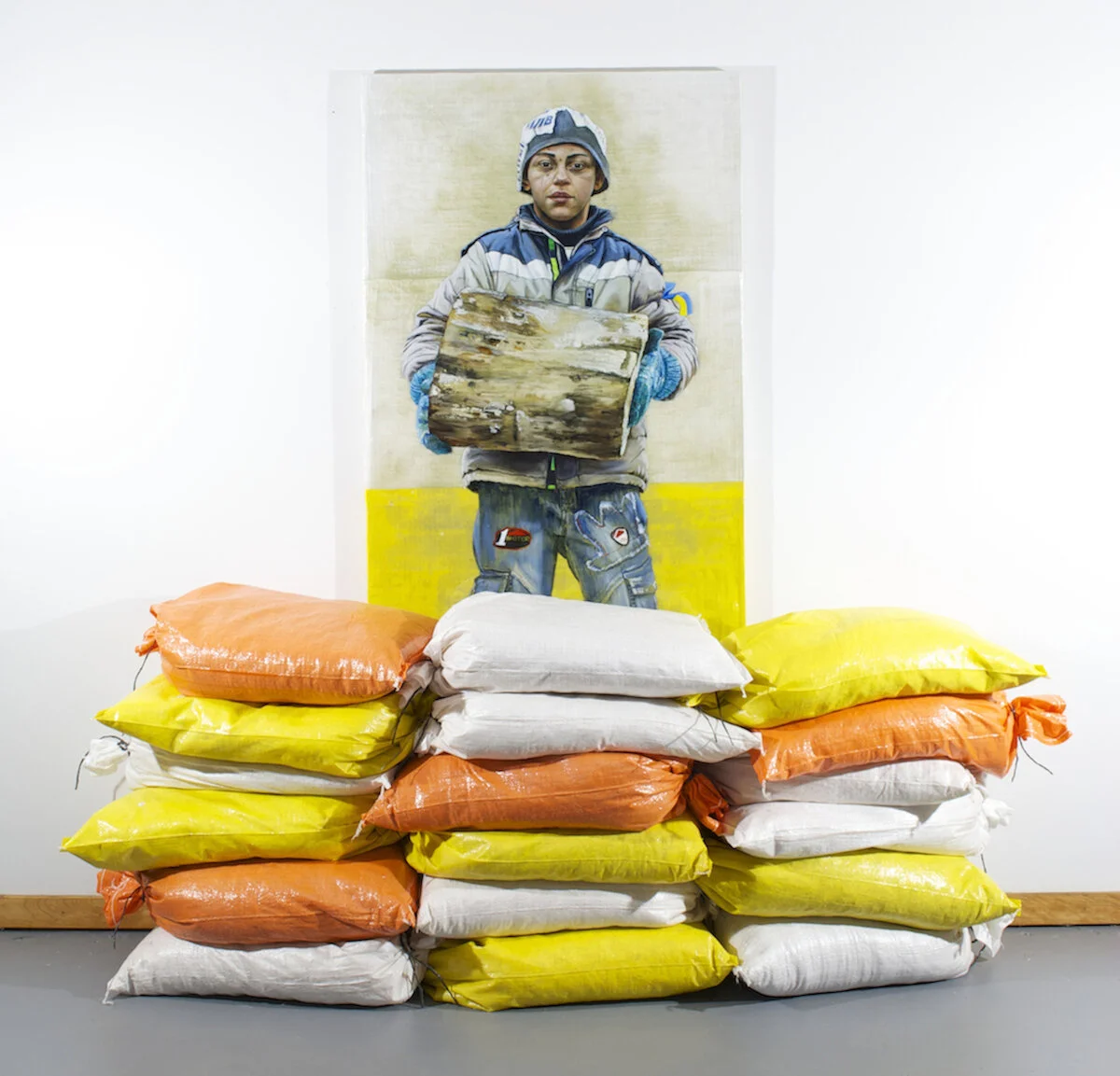   Barrier Builder,   45 x 30”  Sandbags, Resin and Oil on Panel 