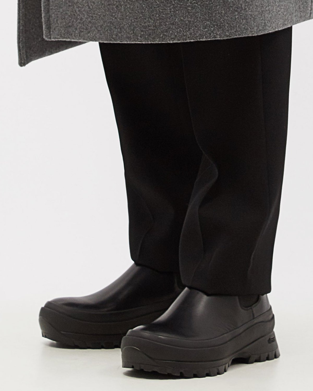 jil-sander-black-lugged-sole-boots-b.jpg