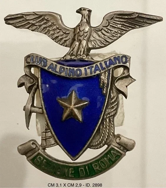 31. Vintage enamel badge of the Club Alpino Italiano, Rome section, featuring an eagle and blue shield emblem.jpg