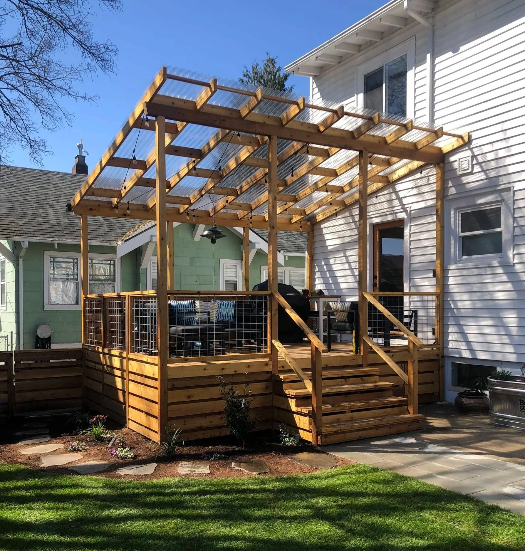 clear roof pergola over deck