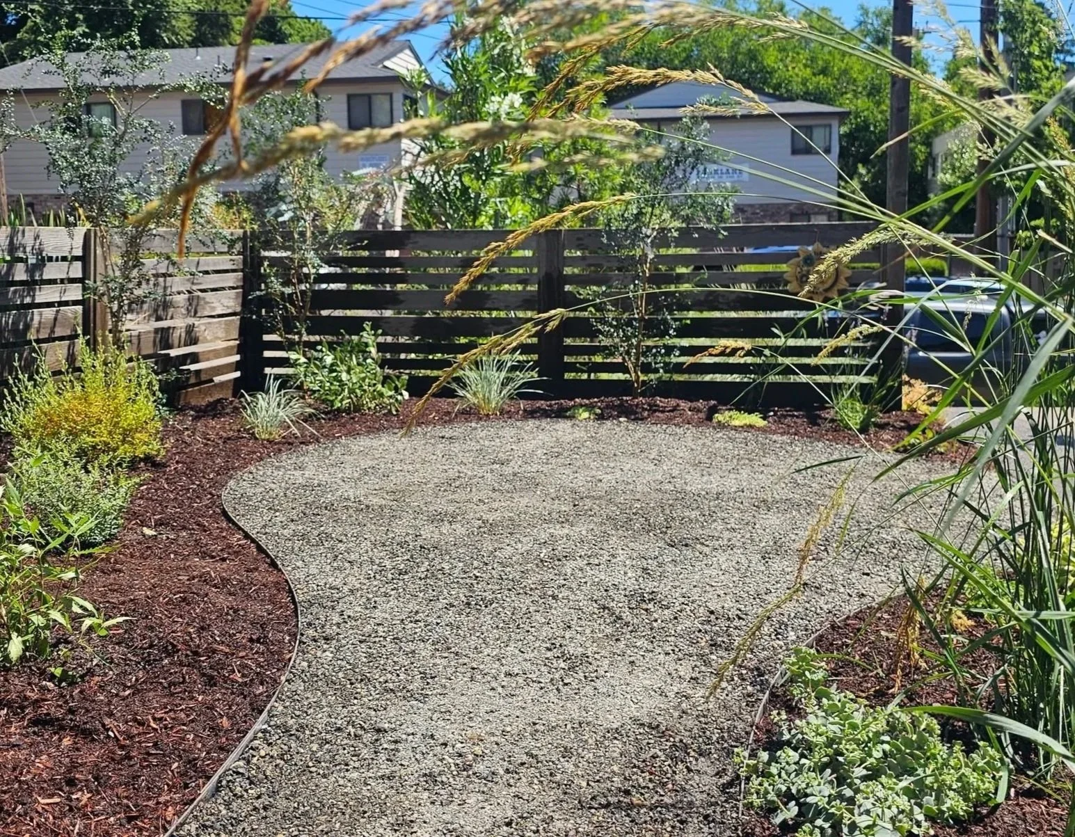 gravel patio edged in flat bar steel