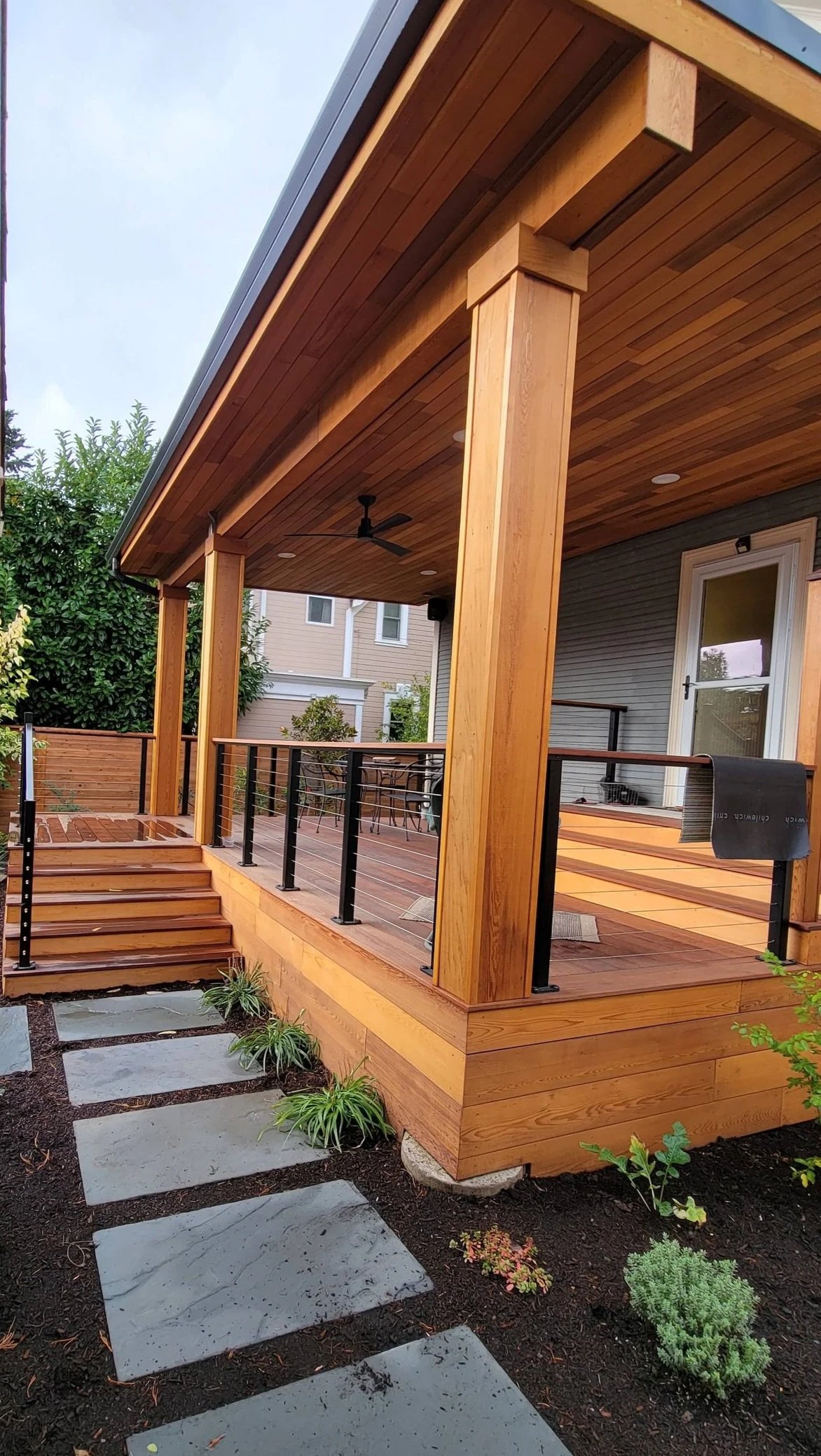 covered deck attached to house