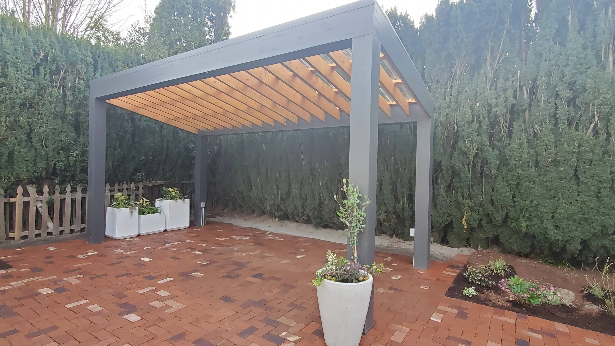 modern pergola brick patio