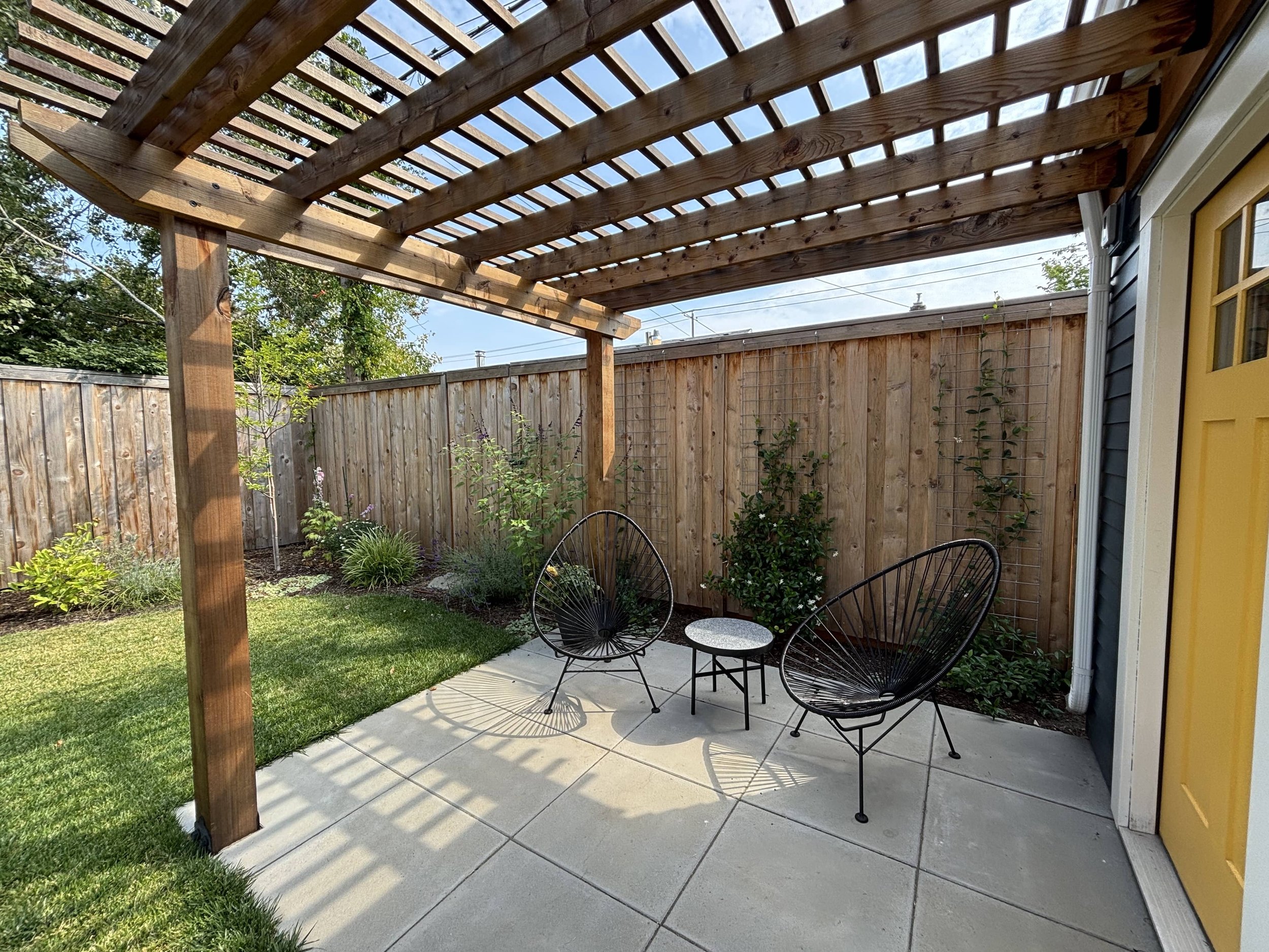 open pergola attached to shed