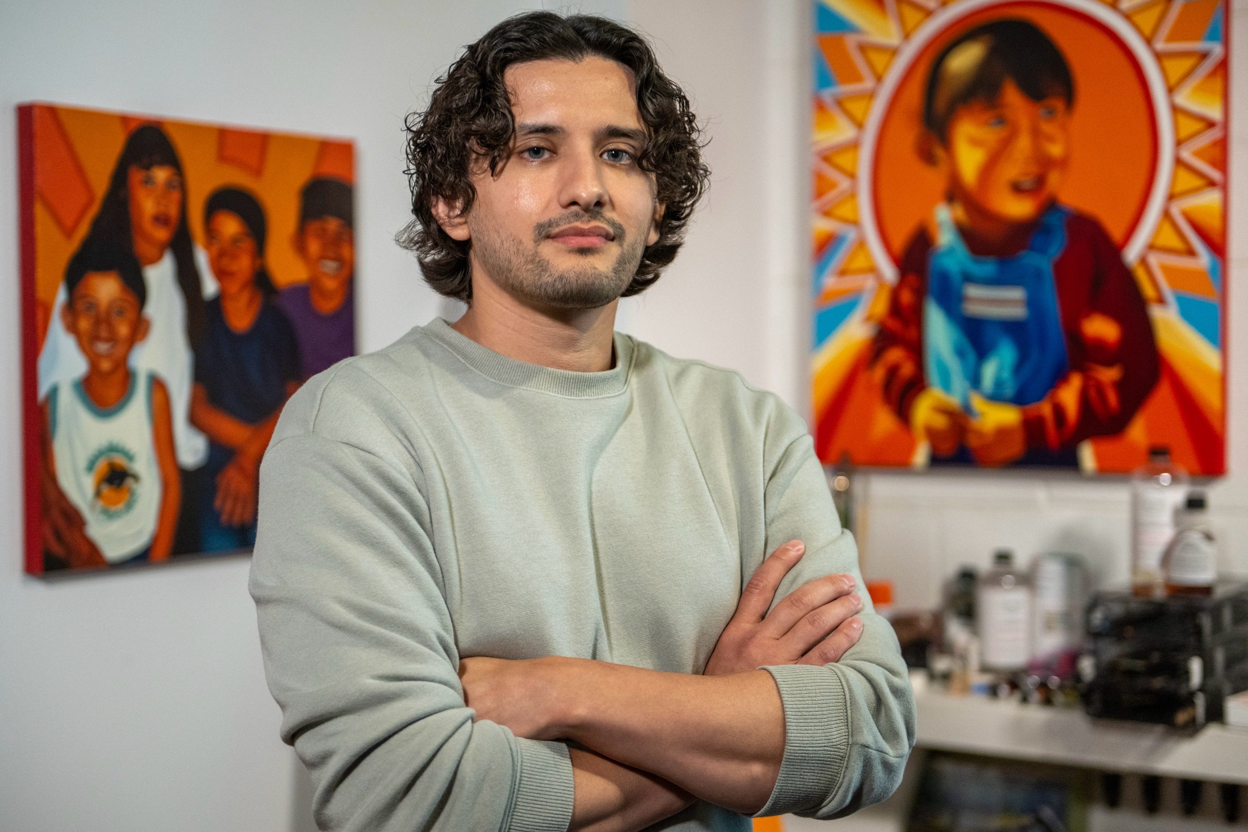  Cesar Velez, visual artist, is seen at his art studio on Tuesday, Aug. 29, 2023, in Kansas City. Velez paints with an expressive color palette. His parents brought him to the Midwest from Mexico, and he remains under DACA. 