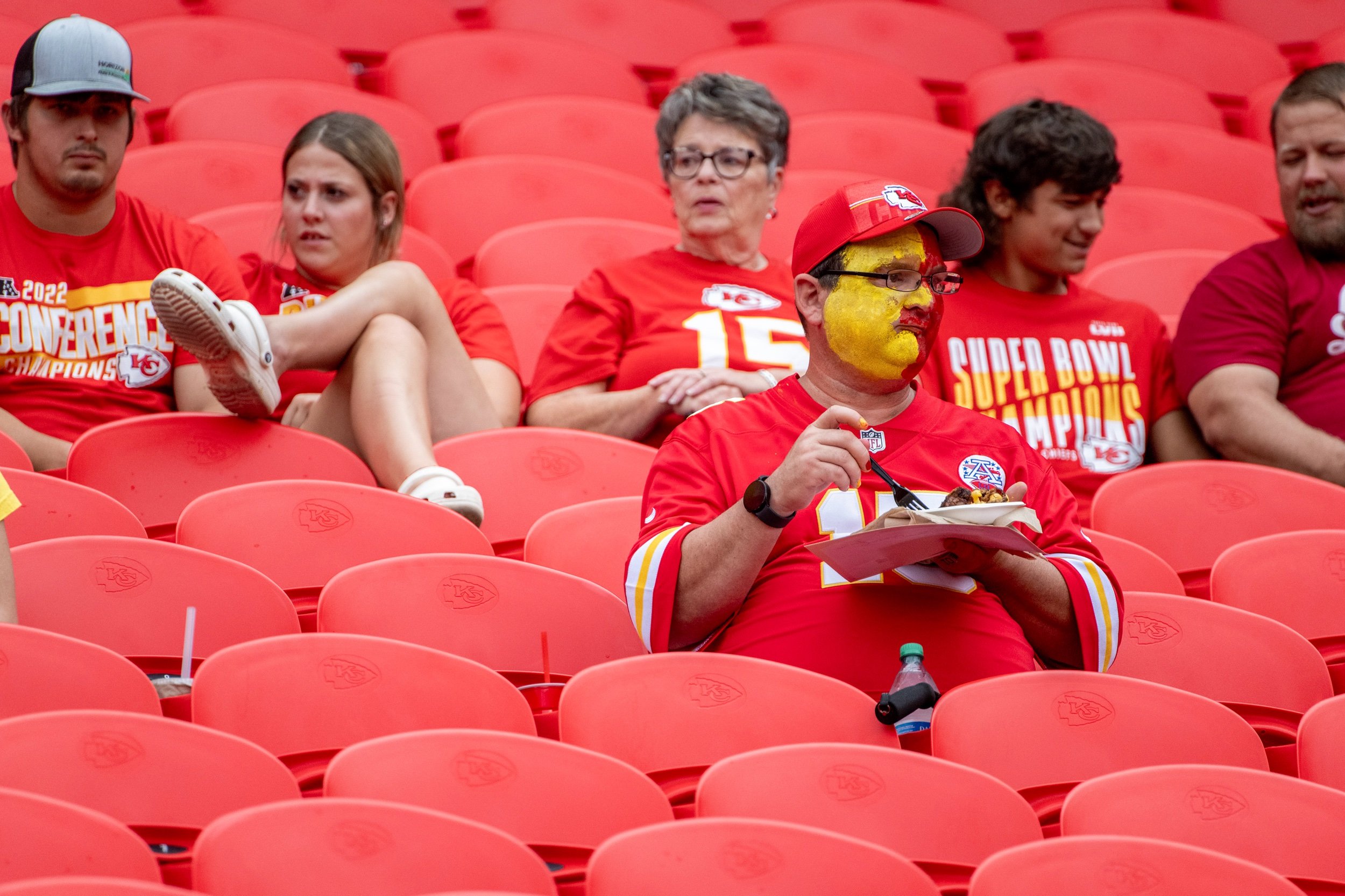  Kansas City Chiefs fans watch players warm up during a preseason game against the Cleveland Browns at GEHA Field at Arrowhead Stadium on Saturday, Aug. 26, 2023, in Kansas City. 