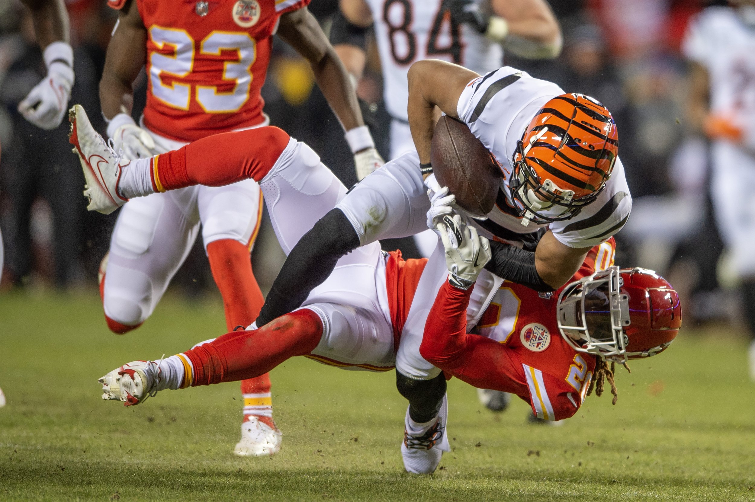  Kansas City Chiefs safety Justin Reid (20) tackles Cincinnati Bengals wide receiver Tyler Boyd (83) in the first half during the AFC Championship NFL football game at GEHA Field at Arrowhead Stadium on Sunday, Jan. 29, 2023, in Kansas City. 