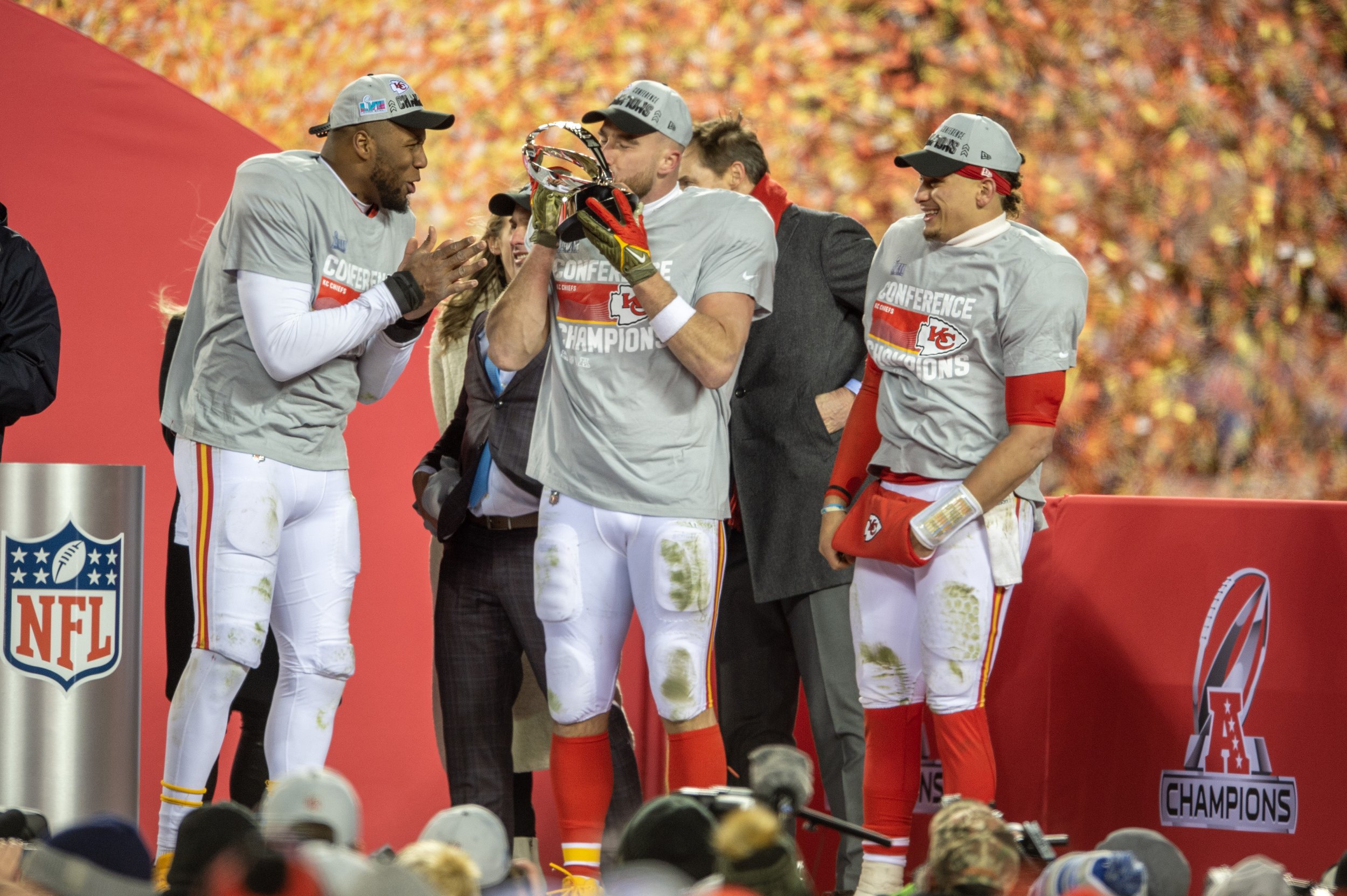  Kansas City Chiefs defensive end Carlos Dunlap (8), left, tight end Travis Kelce (87) and quarterback Patrick Mahomes (15) celebrate after winning the AFC Championship NFL football game against the Cincinnati Bengals at GEHA Field at Arrowhead Stadi