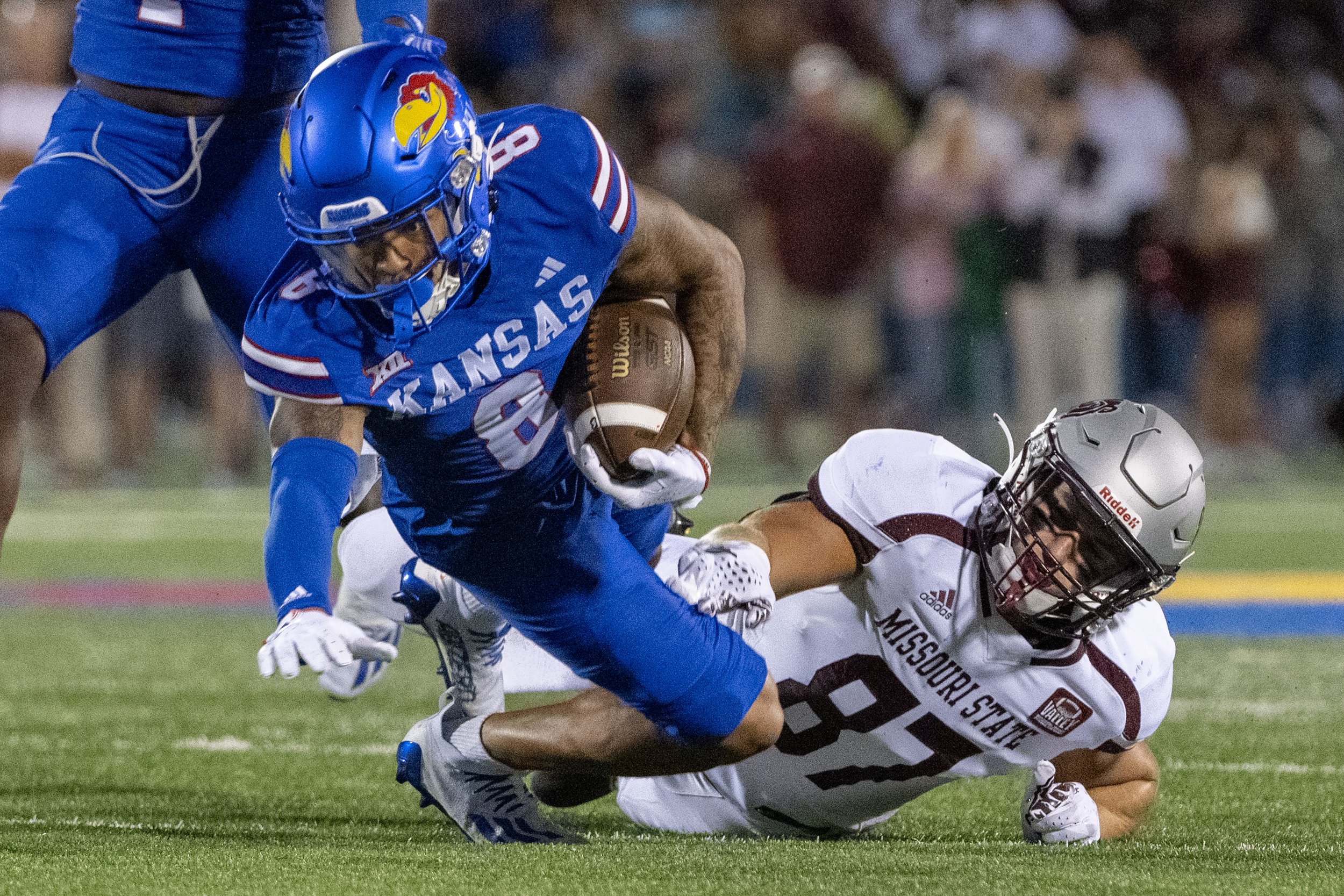  Kansas Jayhawks cornerback Kwinton Lassiter (8) intercepts a pass to Missouri State Bears tight end Gary Clinton (87) in the fourth quarter during the season opening game at David Booth Kansas Memorial Stadium on Friday, Sept. 1, 2023, in Lawrence, 