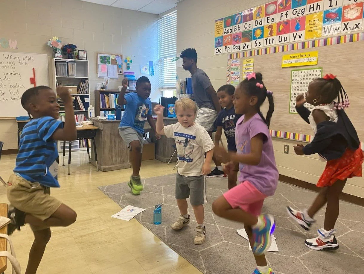 SLAM ILS 2023 Dancing in Classroom.JPG