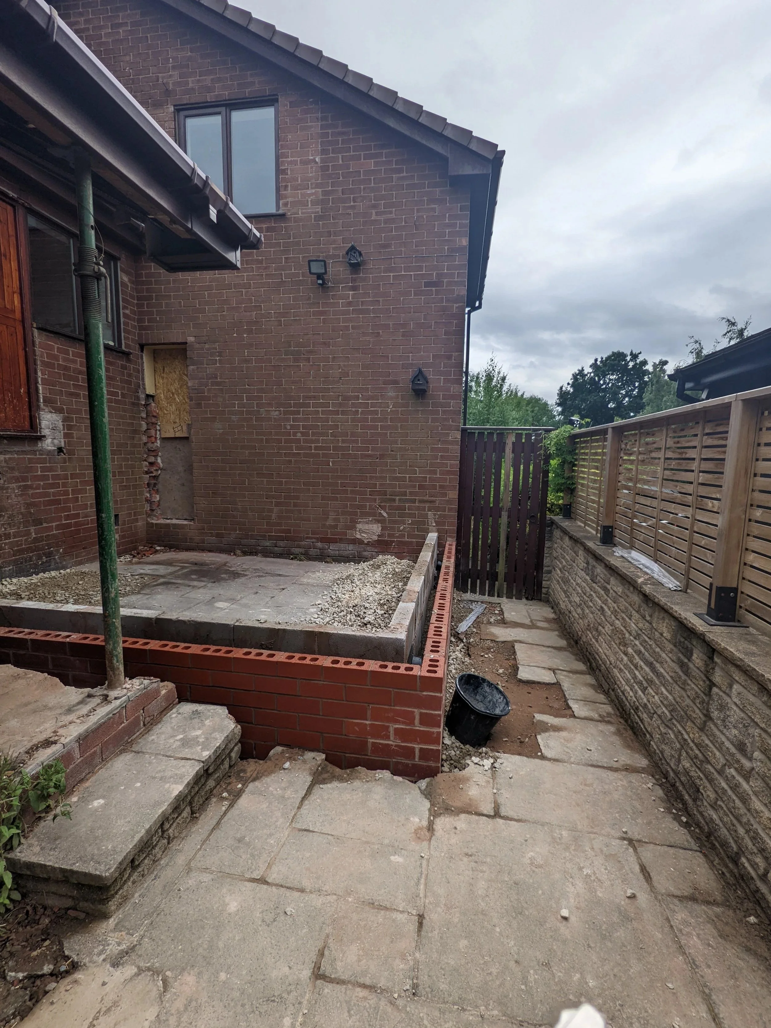 The bedroom slab goes down, using up dead space on the site