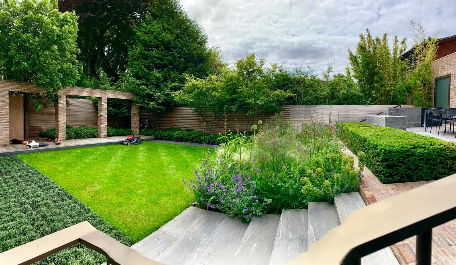 Alaster Anderson Planting Garden Maintenance.jpeg