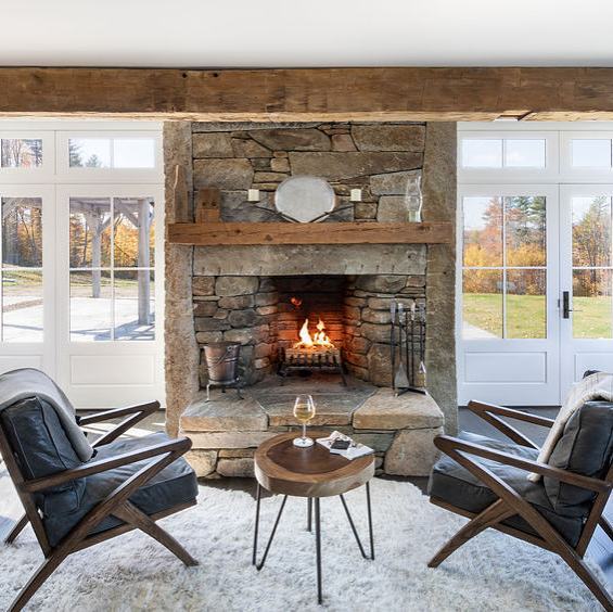 Can you imagine having this fireplace in your kitchen?  What an inspiring place to spend a little time.  Brown Masonry found reclaimed granite posts which they placed from ceiling to floor and infilled between with more locally sourced granite and fi