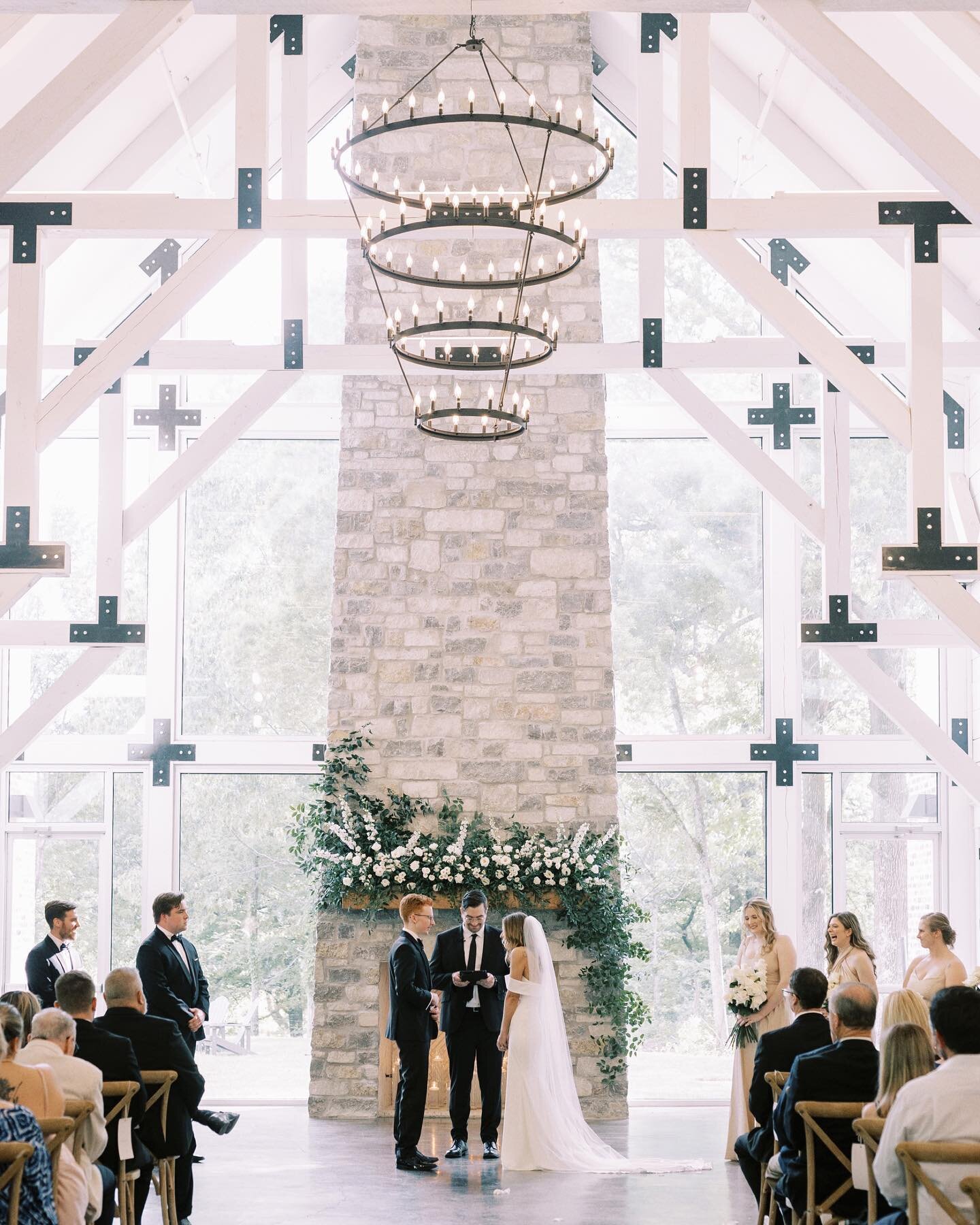 Ahh, the magic of a room flip! Katie and Ethan tied the knot in front of the beautiful mantle (@filamentfloristry). As the bride and groom were whisked away by photographers, @bradandjen, their guests enjoyed cocktail hour on our large patio. Meanwhi