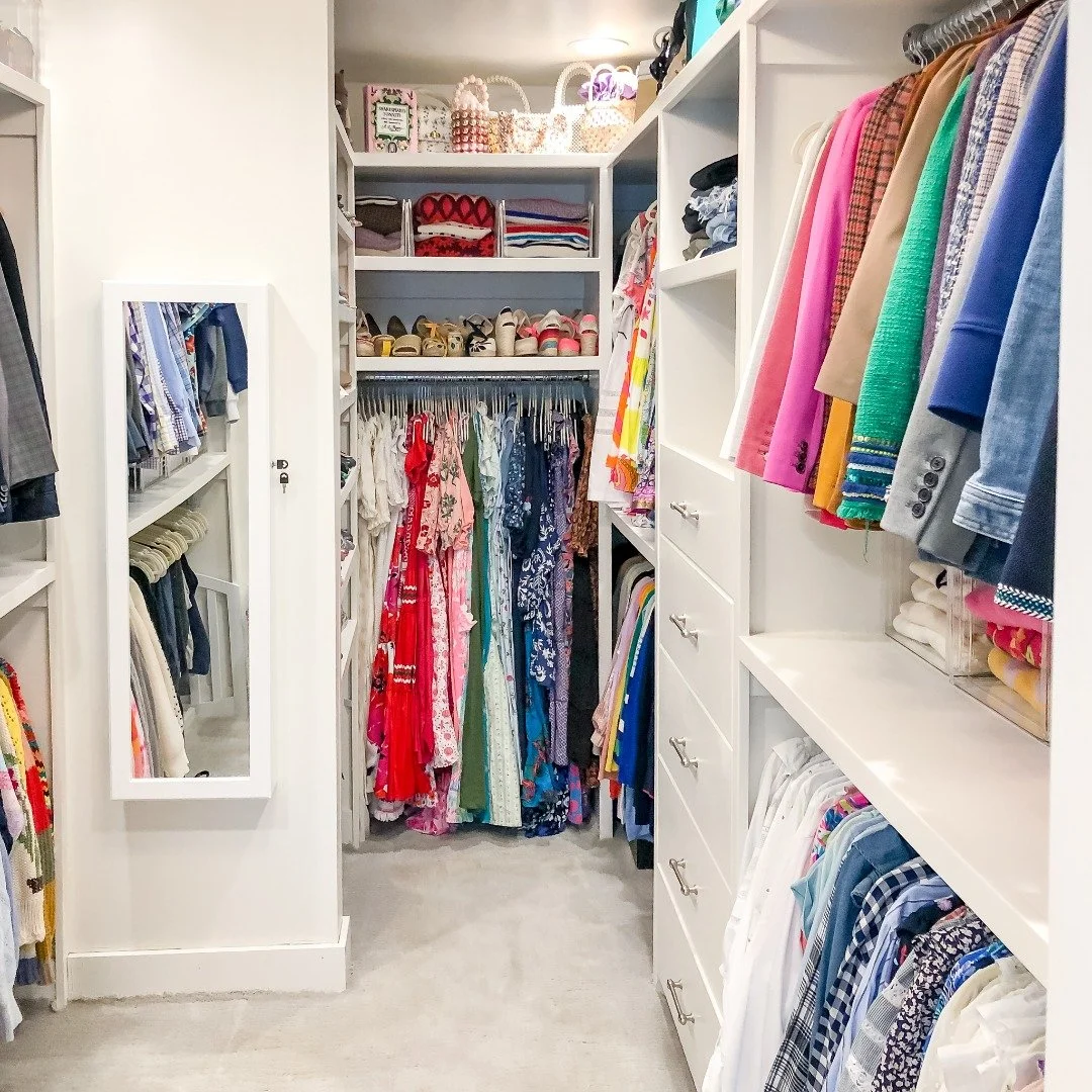 Primary closet organized during a Preston Hollow move-in