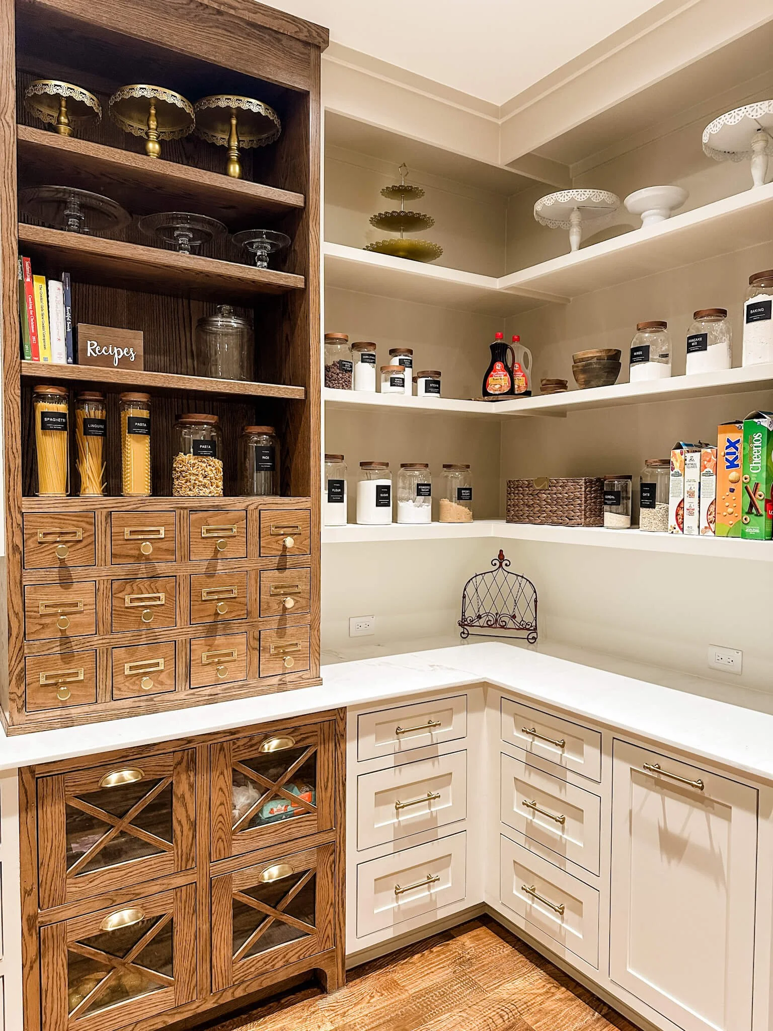 Professional home organizer creating labeled pantry storage in University Park