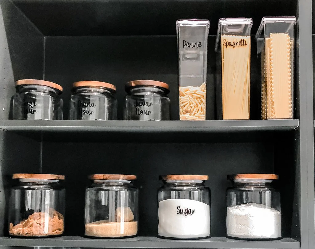 Labeled pantry containers organized for a Highland Park family