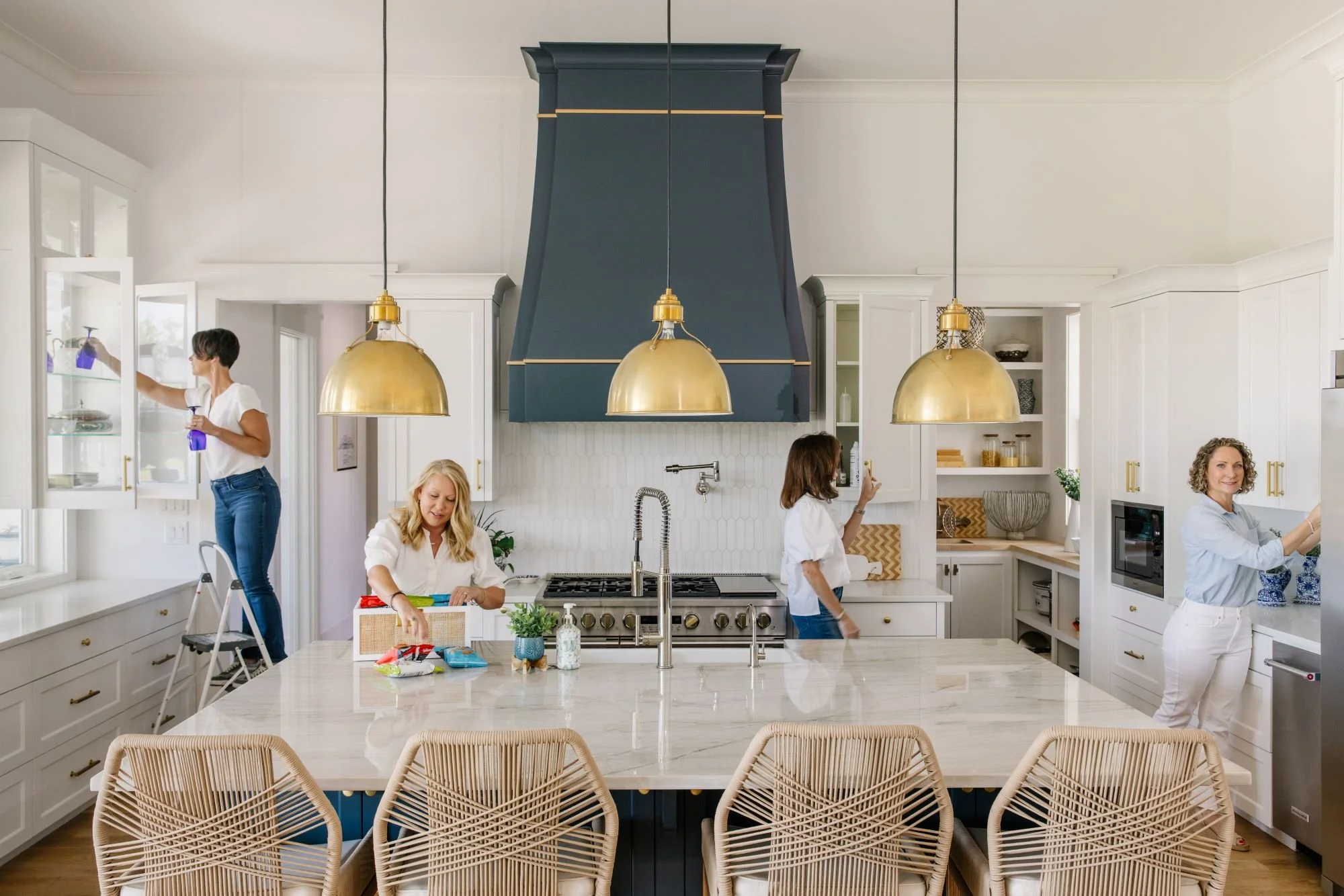 Organized Calm professional organizers working in a Dallas home