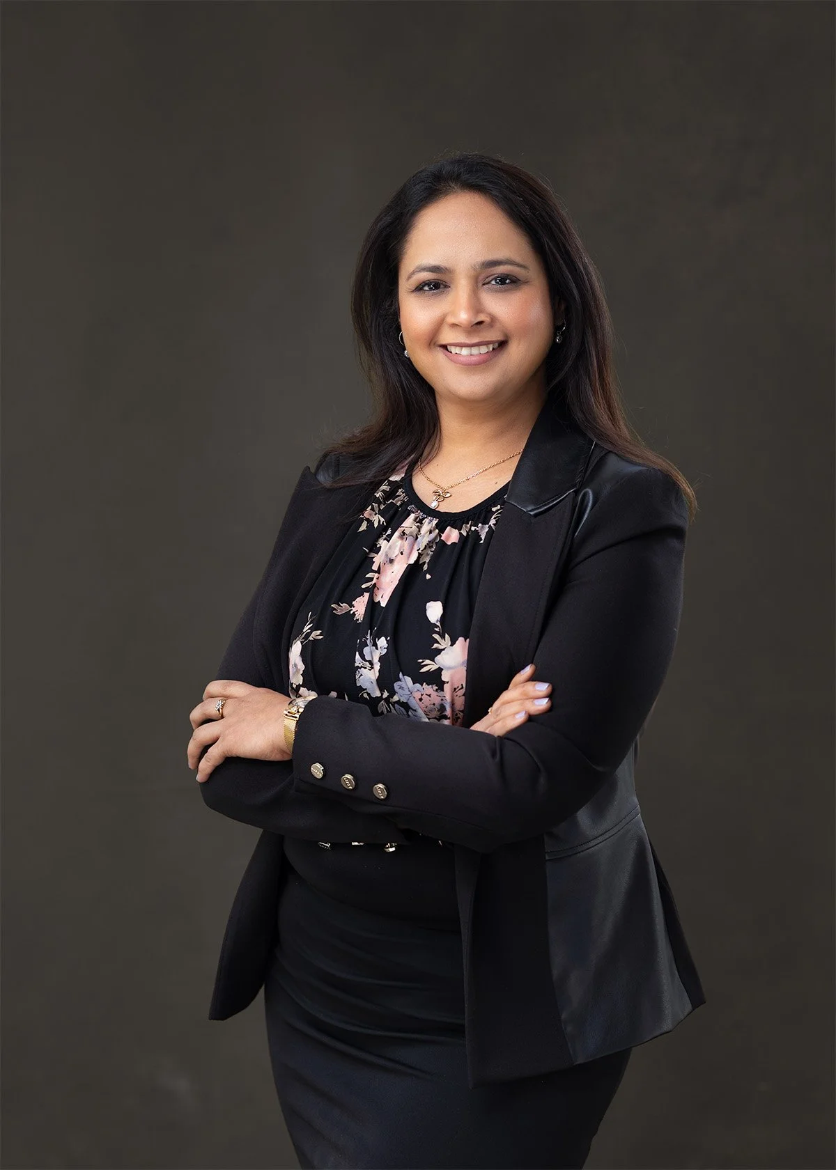 Professional woman with dark hair in a blazer, a headshot captured by Reading photographer
