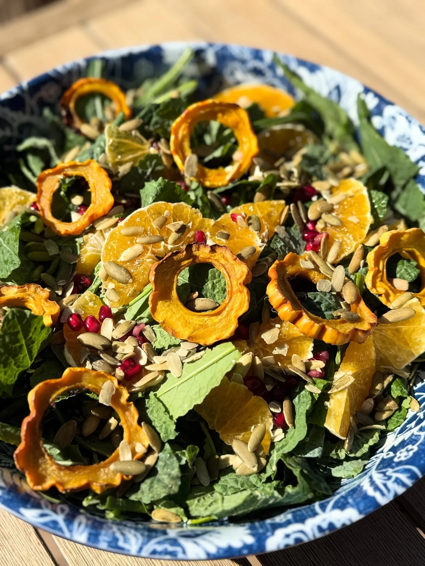 Roasted Delicata Squash over baby kale with oranges, pomegranate and pepitas. 
This fall salad really pears well with either of our certified organic Real Food Dressings - depending on which mood you are in. Enjoy and always love to hear what your f