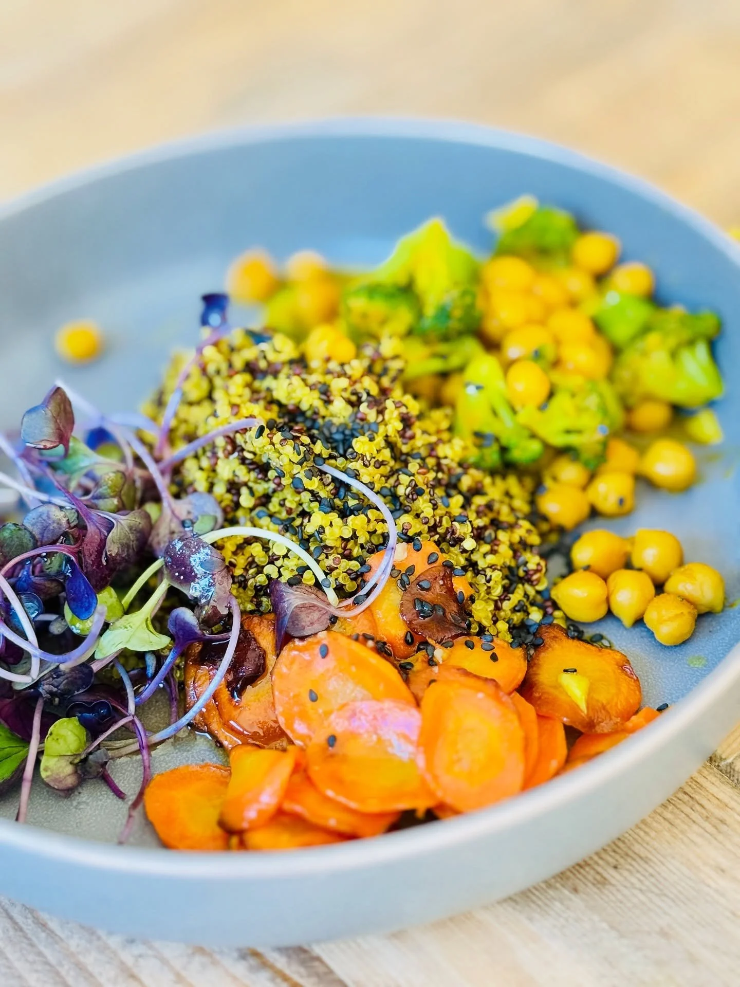 Nourish &amp; Restore: Golden healing in a bowl 🌞 

Tri-color quinoa kissed with turmeric, paired with ginger carrots, cumin-scented chickpeas, vibrant broccoli, and fresh micro radishes. Drizzled with our Red Sunflower Dressing for that radiant fin