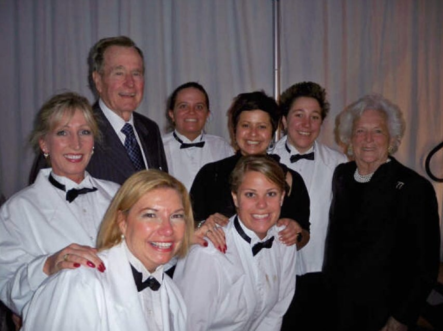 Former President George H. W. Bush with TASTE Catering team
