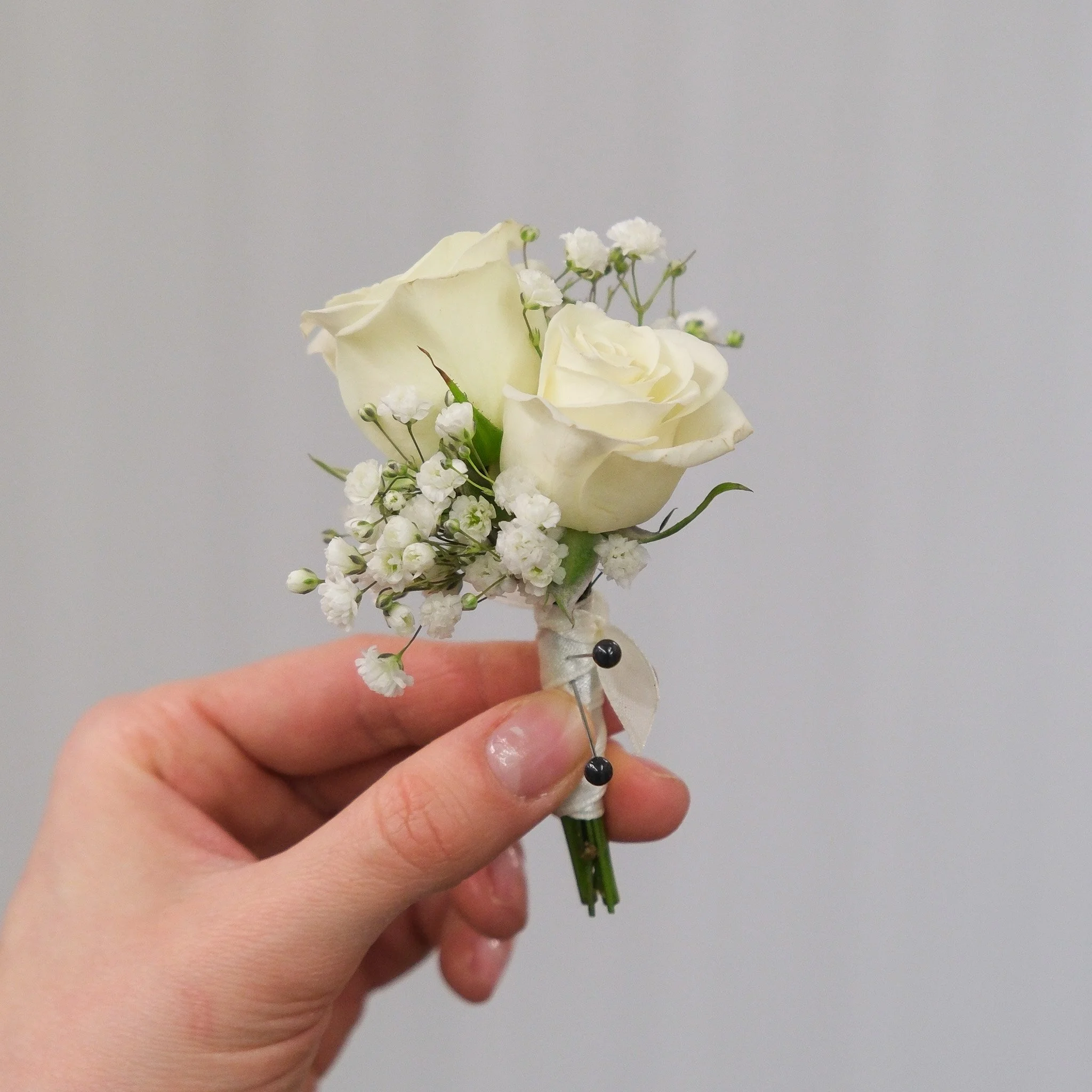 FF_SmallBoutonniere_DoubleRoseBabyBreath01.jpg