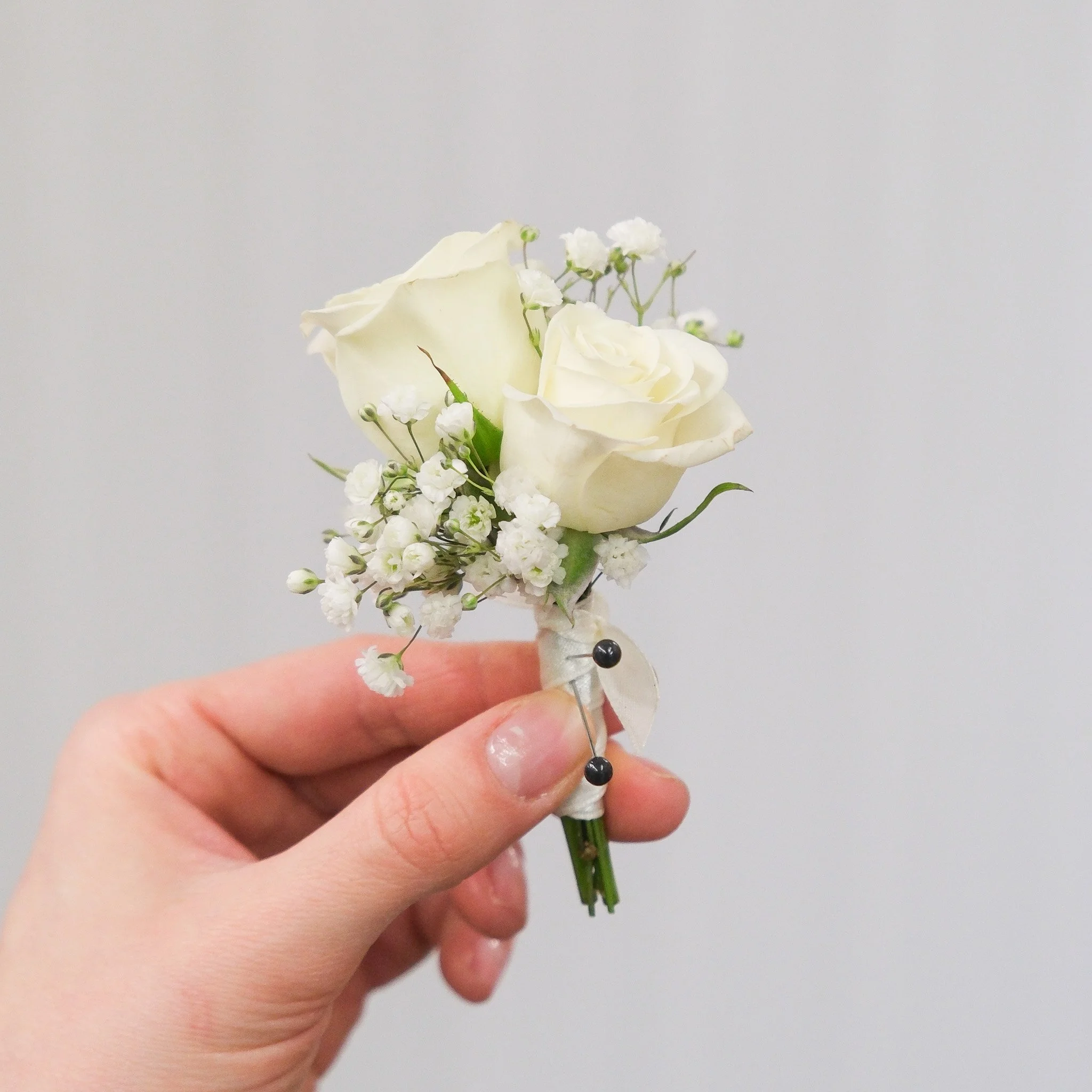 FF_SmallBoutonniere_DoubleRoseBabyBreath01.jpg