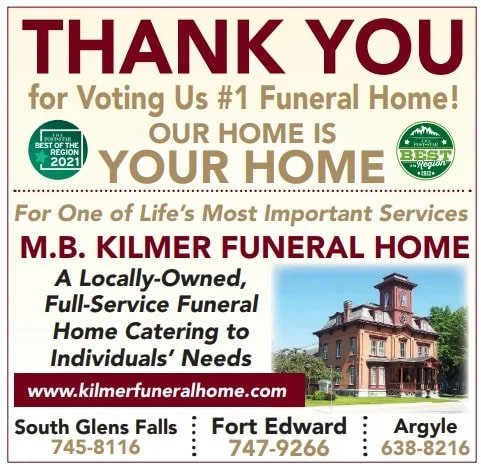 A funeral home's advertisement expressing gratitude for voting it as the number one funeral home, highlighting its locally-owned, full-service offerings, with images of a historic building and contact information for locations in South Glens Falls, Fort Edward, and Argyle.