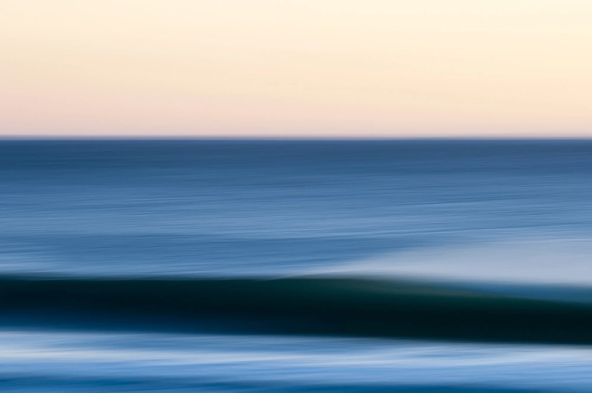 "Speed" by Ryan Cardone, slow-exposure ocean wave pan shot at Zuma Beach