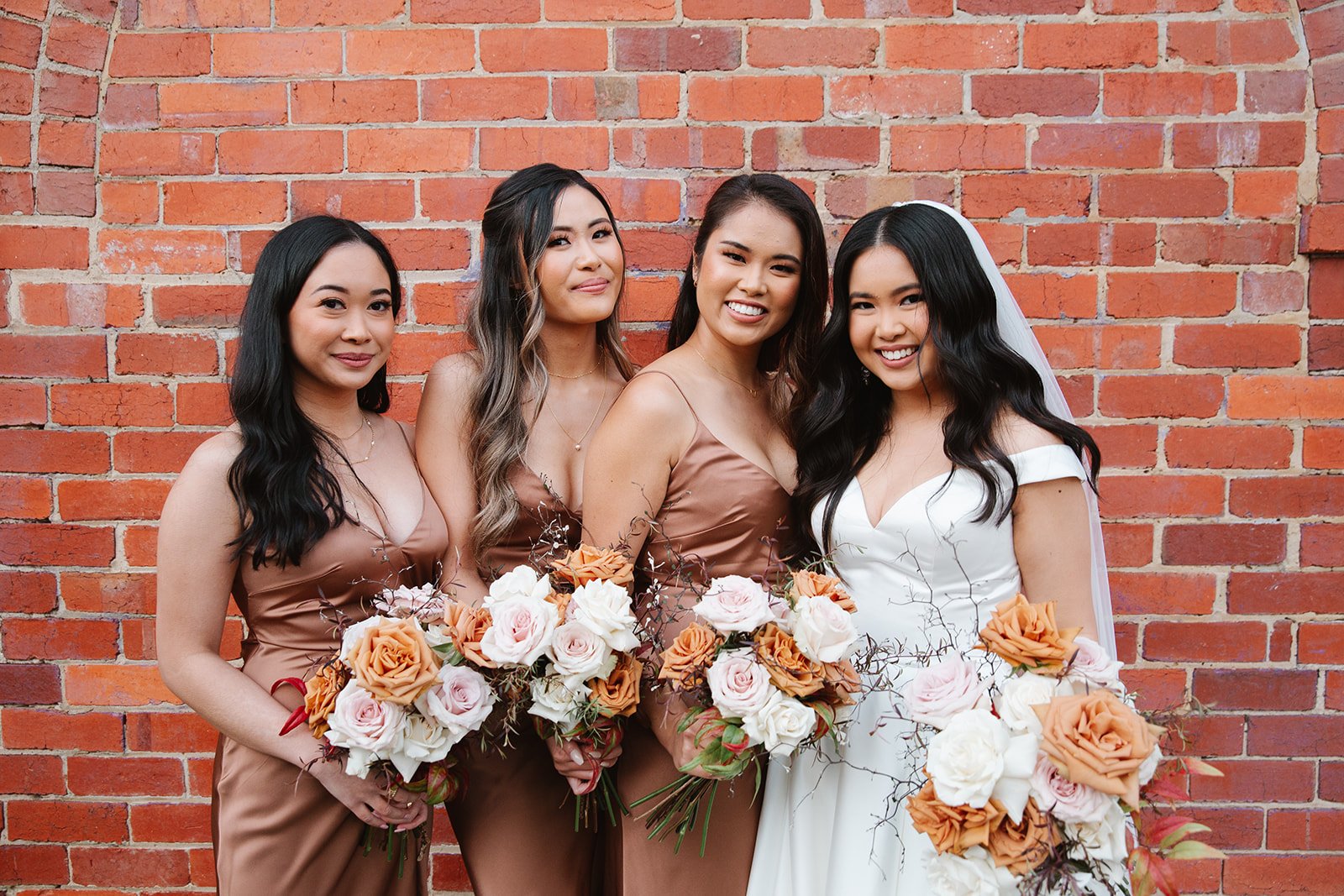 Bride and Bridesmaids bouquets with toffee and quicksand roses