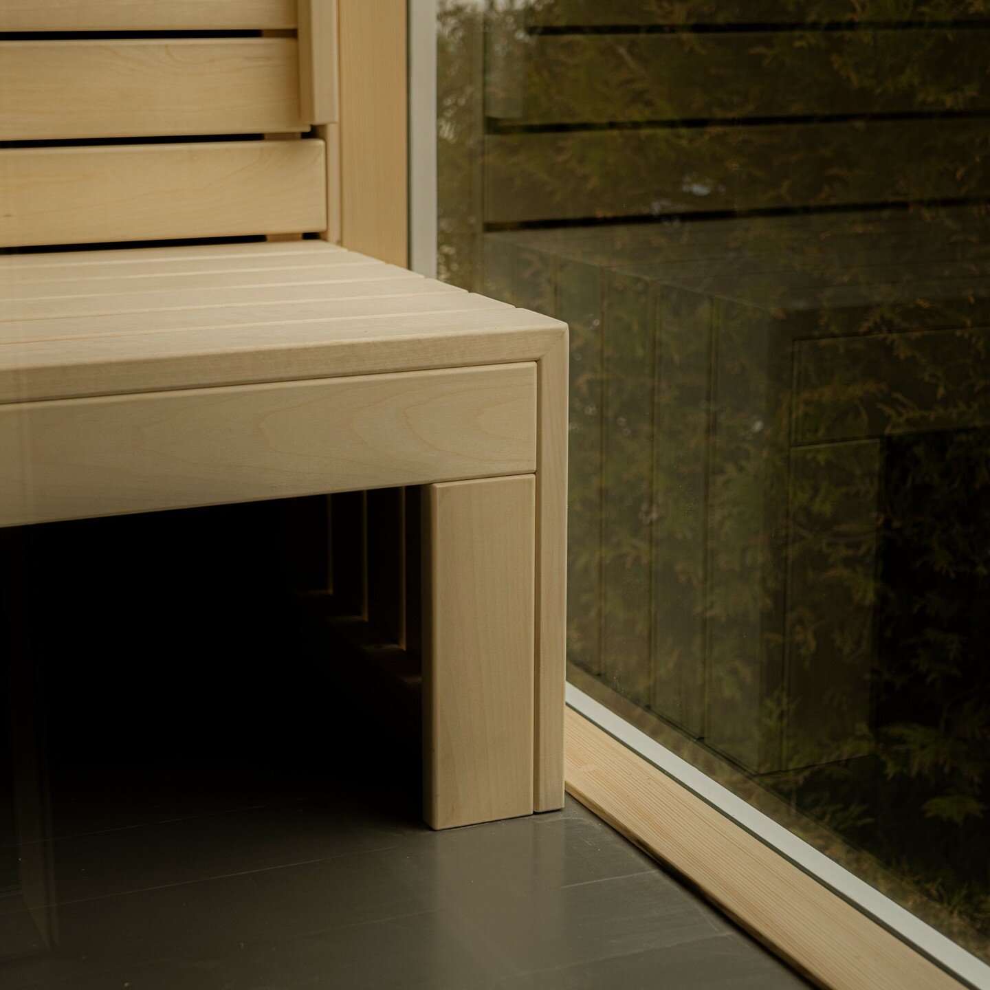 Bench detail next to full height window in the stunning sauna of our recent client @sawnallosgi in Wales.

Are you looking to take your private or professional wellness setup to the next level?

We have plenty of experience and happy clients and are 