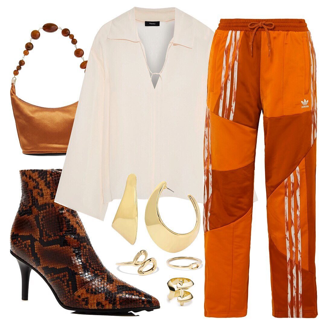   Earrings: Robert Lee Morris | Ring Set: Ippolita | Statement Ring: Third Crown | Bag: Cult Gaia | Top: Theory | Pants: Adidas | Shoes: Rag &amp; Bone    For a comfy look that still looks polished, pair your track pants with a blouse that’s in a sof