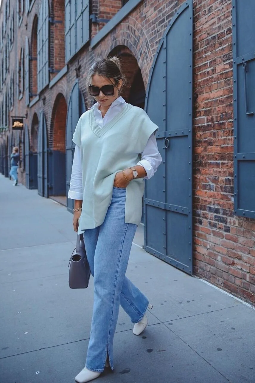 Oversized knit vest with white button down and straight leg jeans