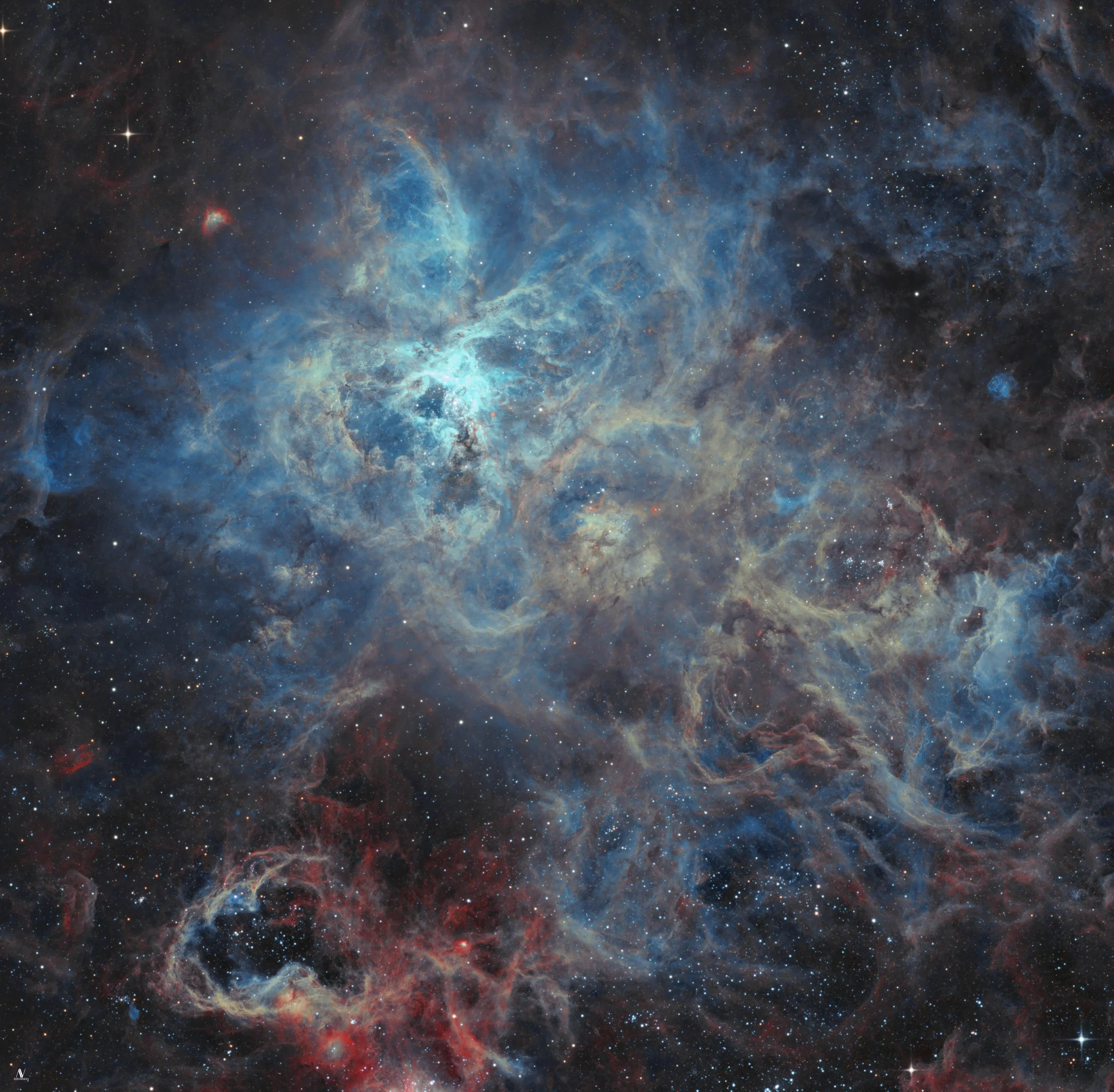 Turbulent blue and red emission clouds surrounding the dense star cluster NGC 2070 at the core of the Tarantula Nebula in the Large Magellanic Cloud.