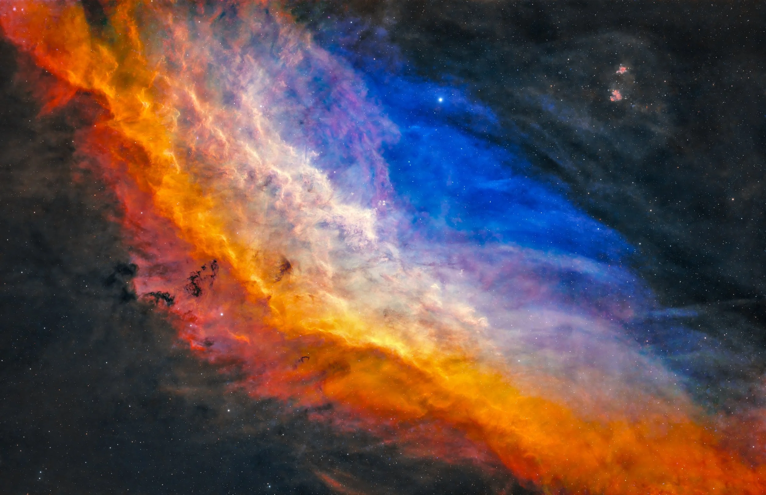 The California Nebula NGC 1499 imaged in SHO narrowband from a Bortle 7 sky, showing intricate hydrogen and oxygen structures.