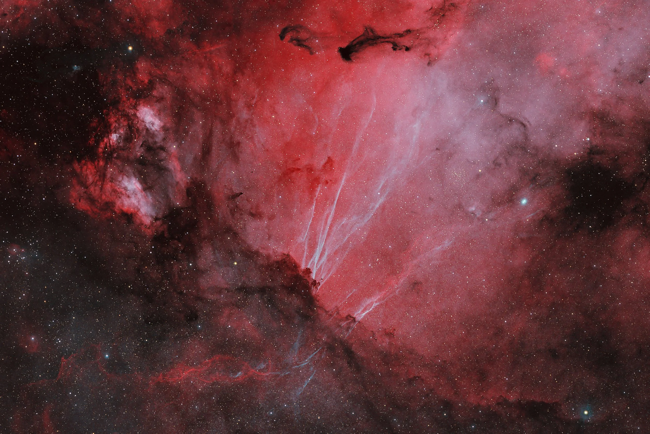 SNR G013.3-01.3 and its long, tightly grouped, glowing filaments