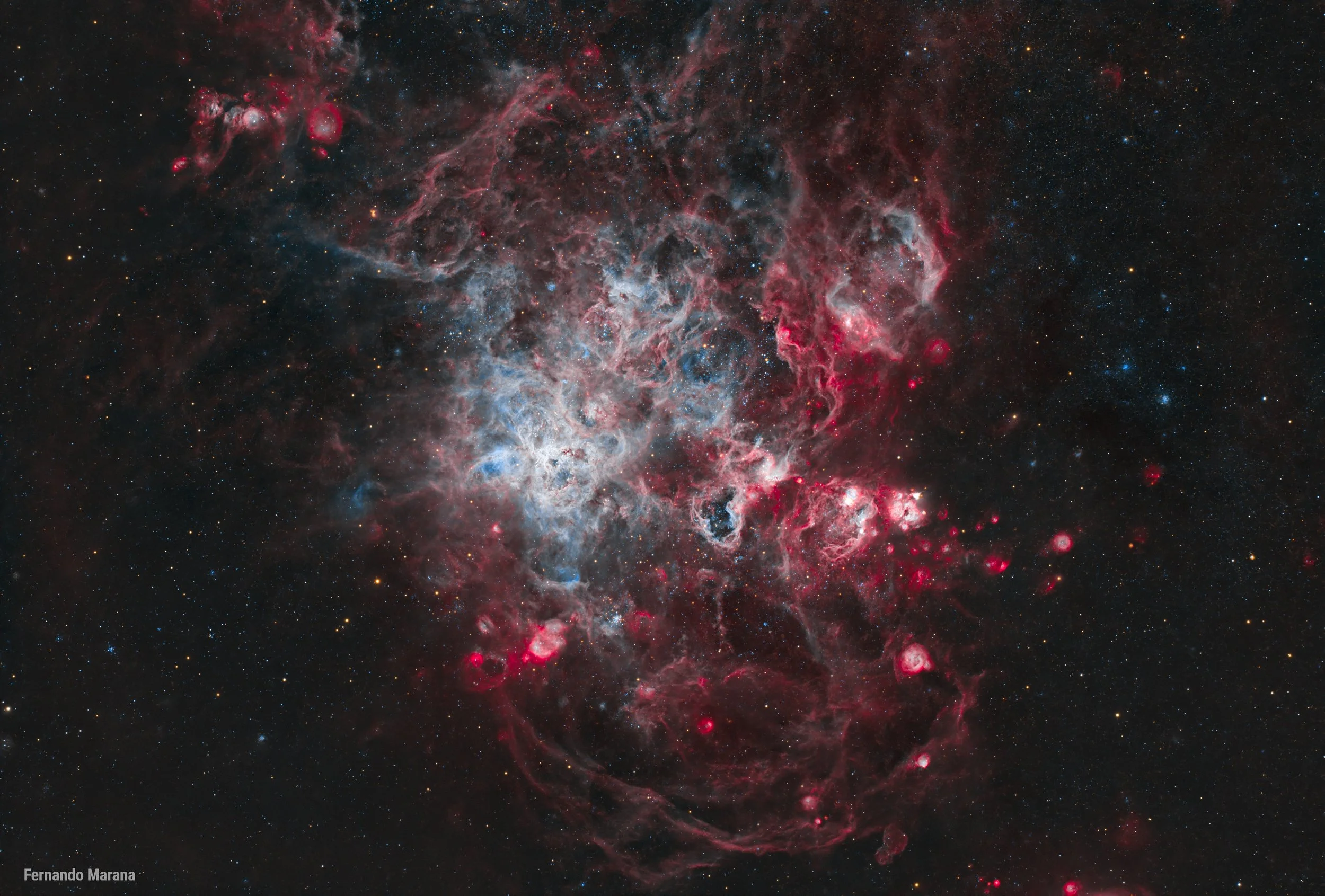 Tarantula Nebula — Threads of Fire in the Large Magellanic Cloud