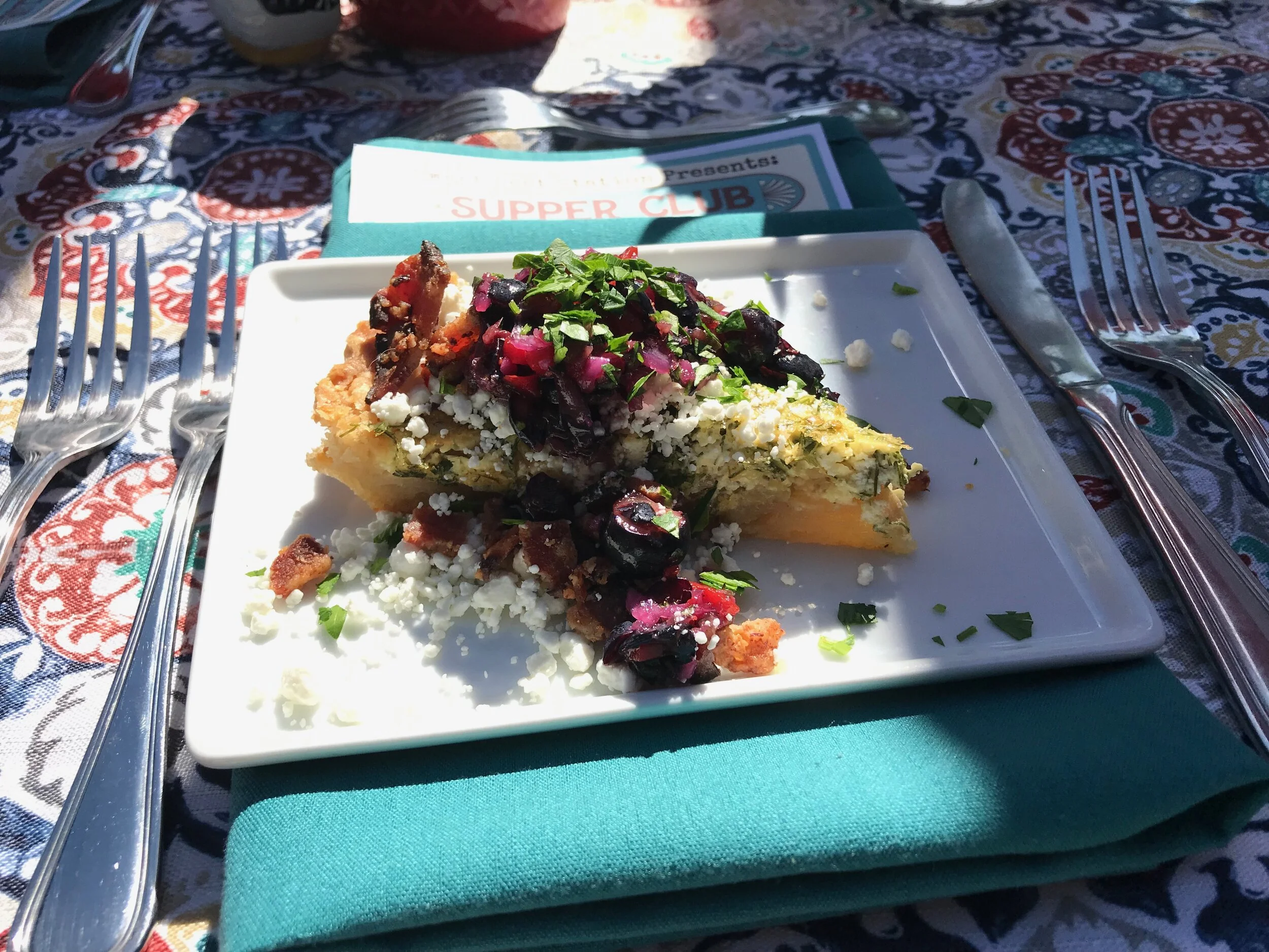 Roasted Fennel, Chevre & Scallion Tart w/ Spicy Blueberry Relish & Crisp Bacon Garnish paired w/ South Stage 2014 Romeo & Juliet