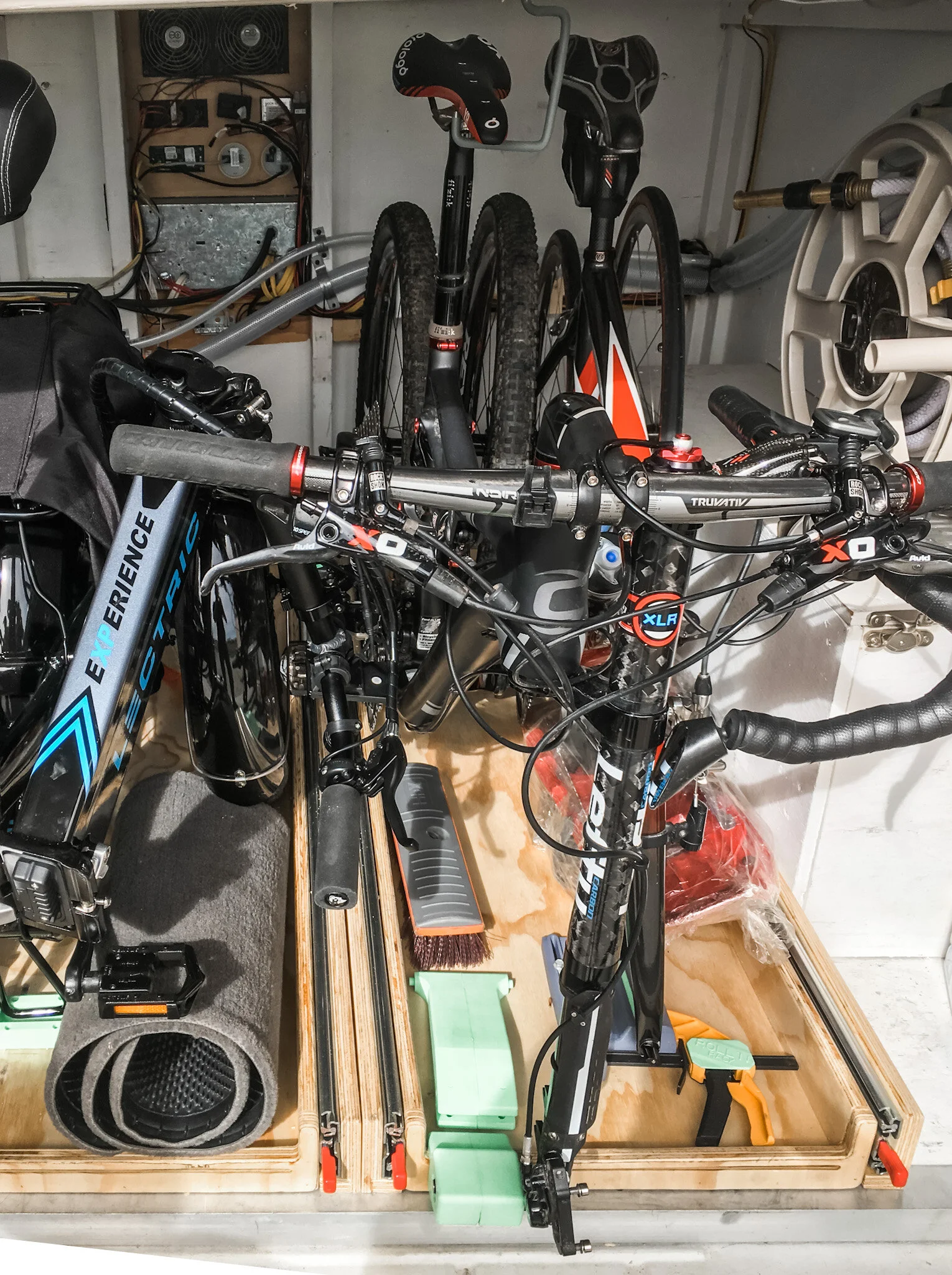 Three bikes on two pull-out racks