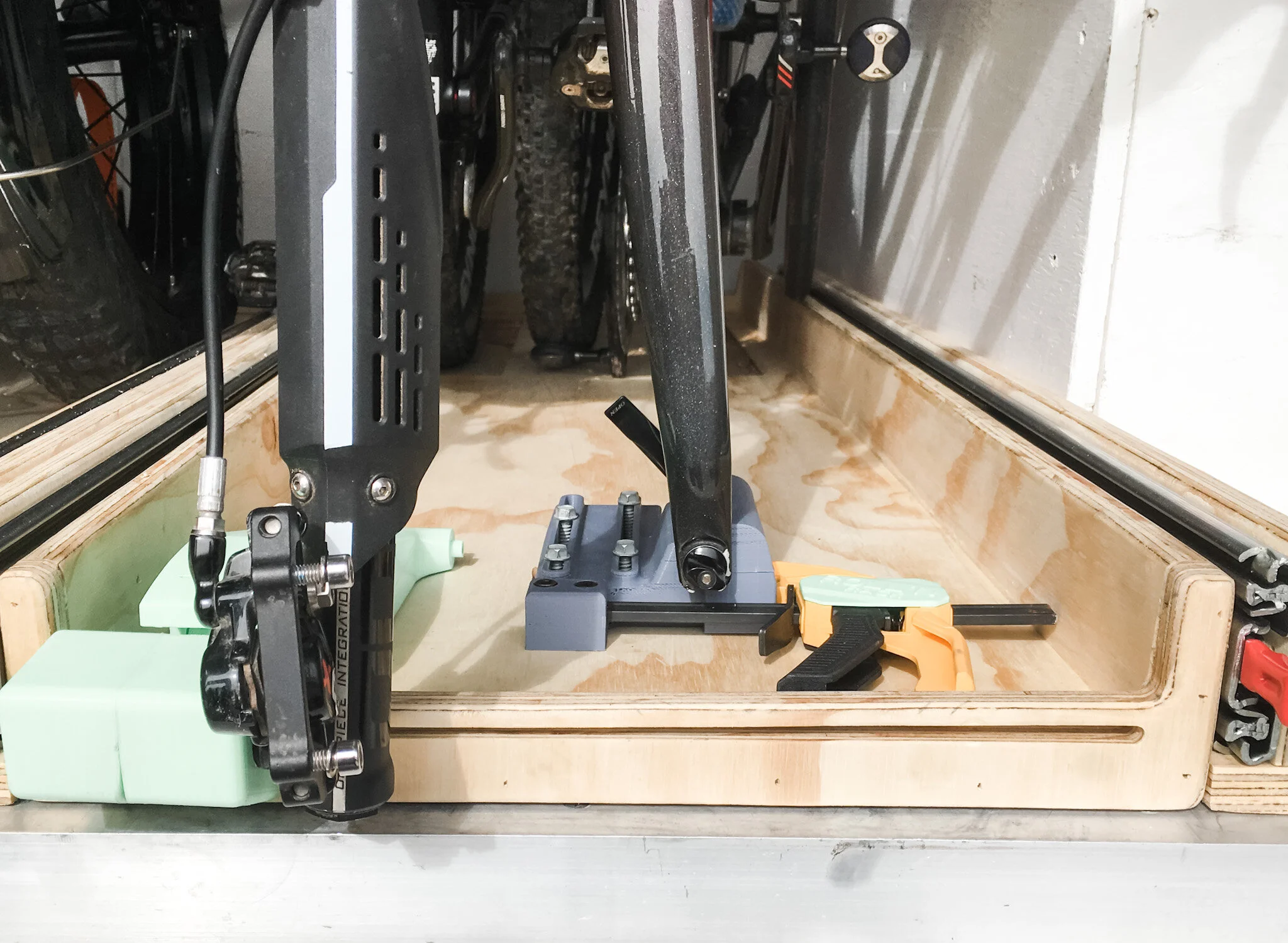 ORU's Roll N Rack (patent pending) allows space for 3 bikes in a space of 38" (width) x 54" (depth)