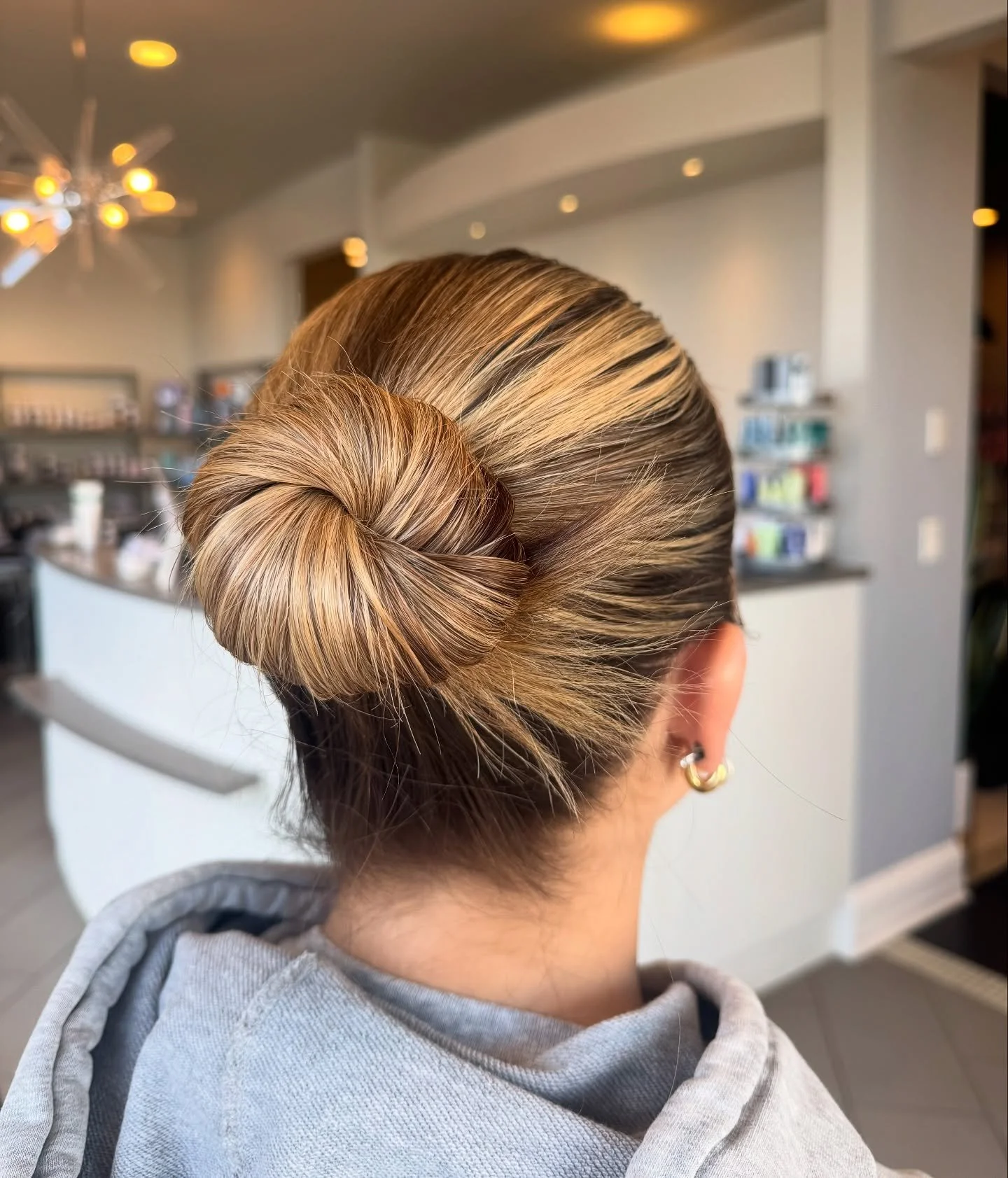 Not your average slicked back bun 😏 

Business in the front, party in the back is on a whole new level with this recent event style for @buttonista by Emily! Have a special event coming up where you want to look your best? Give us a call and we will