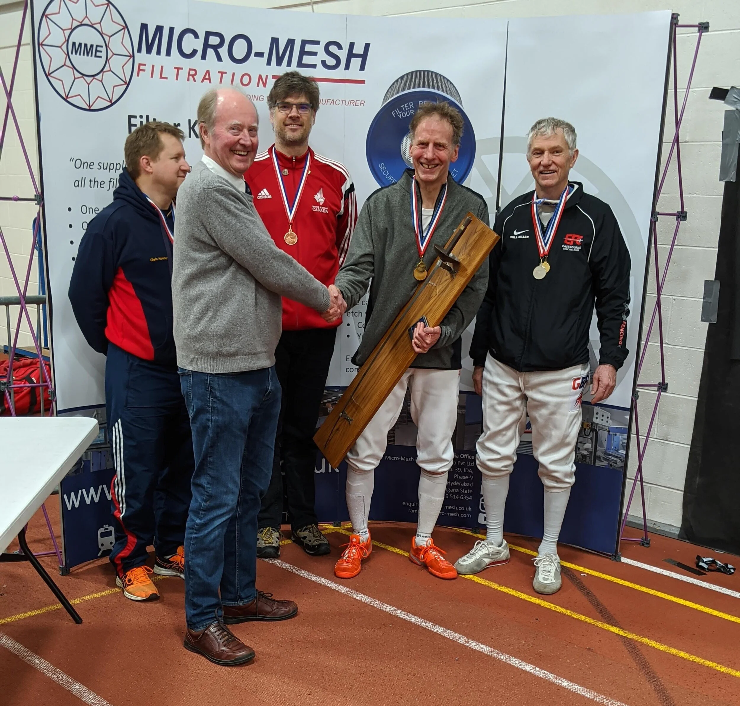 Neal Mallett Wins Title