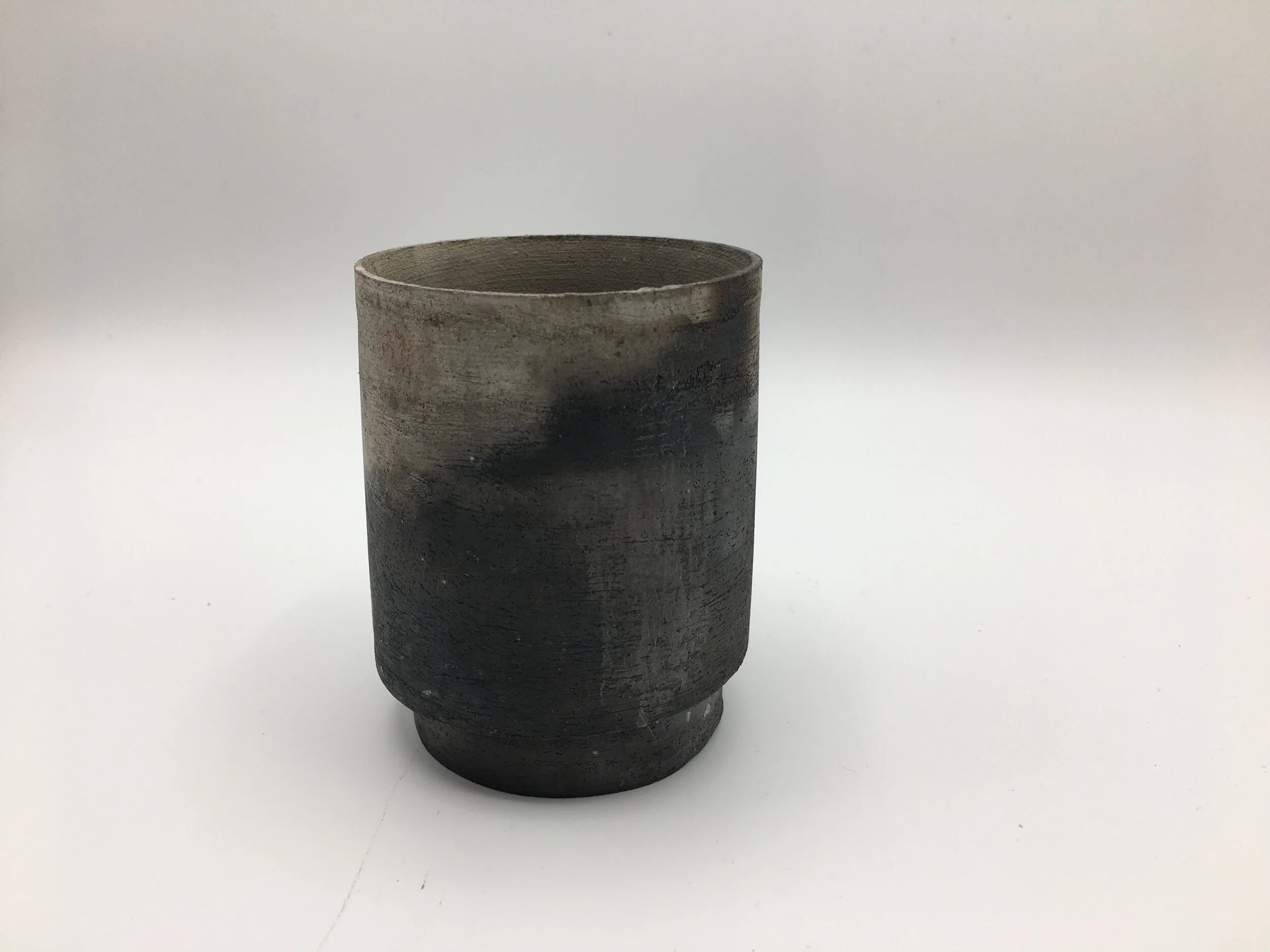 Barrel fired tumbler