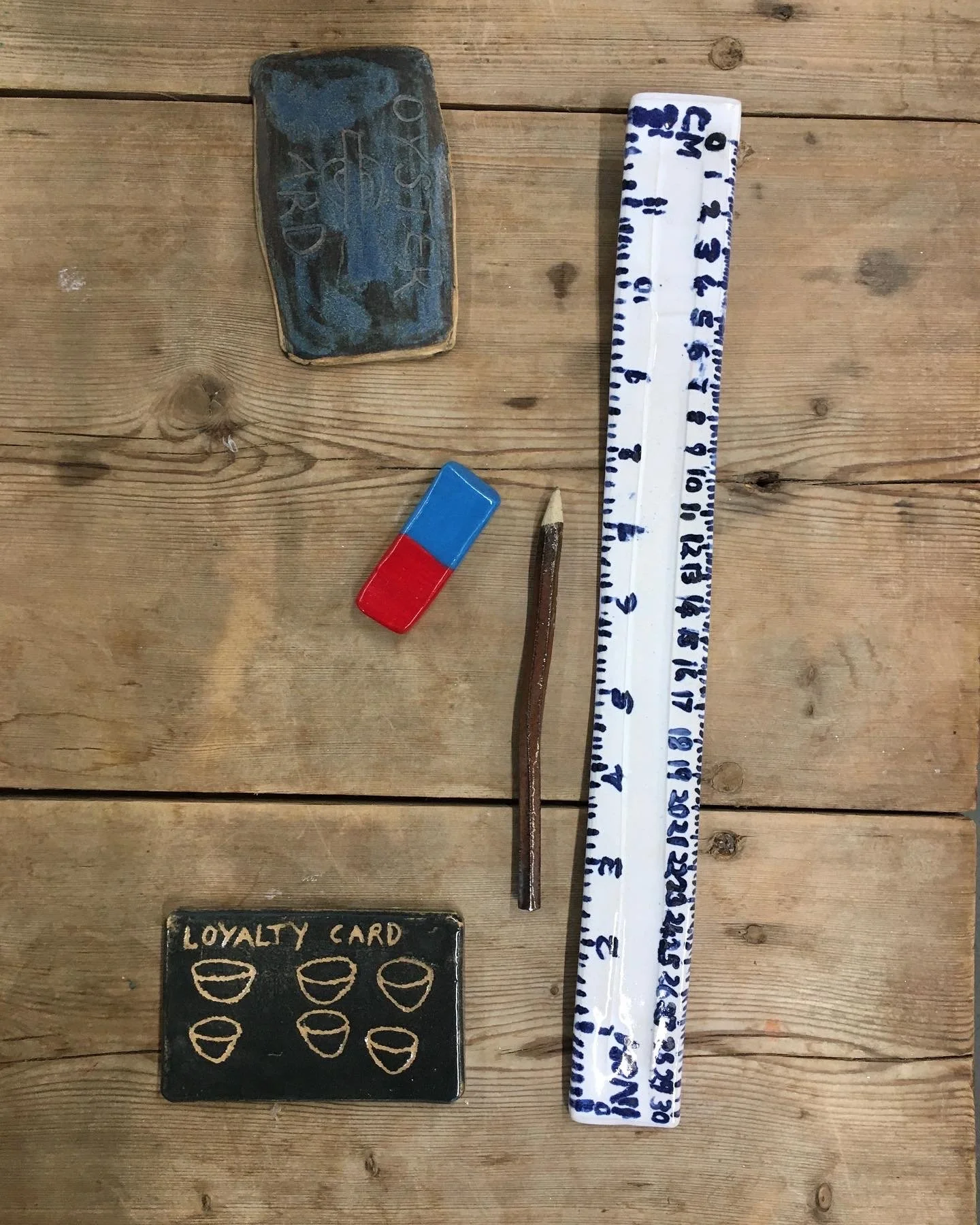 Ruler, eraser, pencil, loyalty card, oyster card