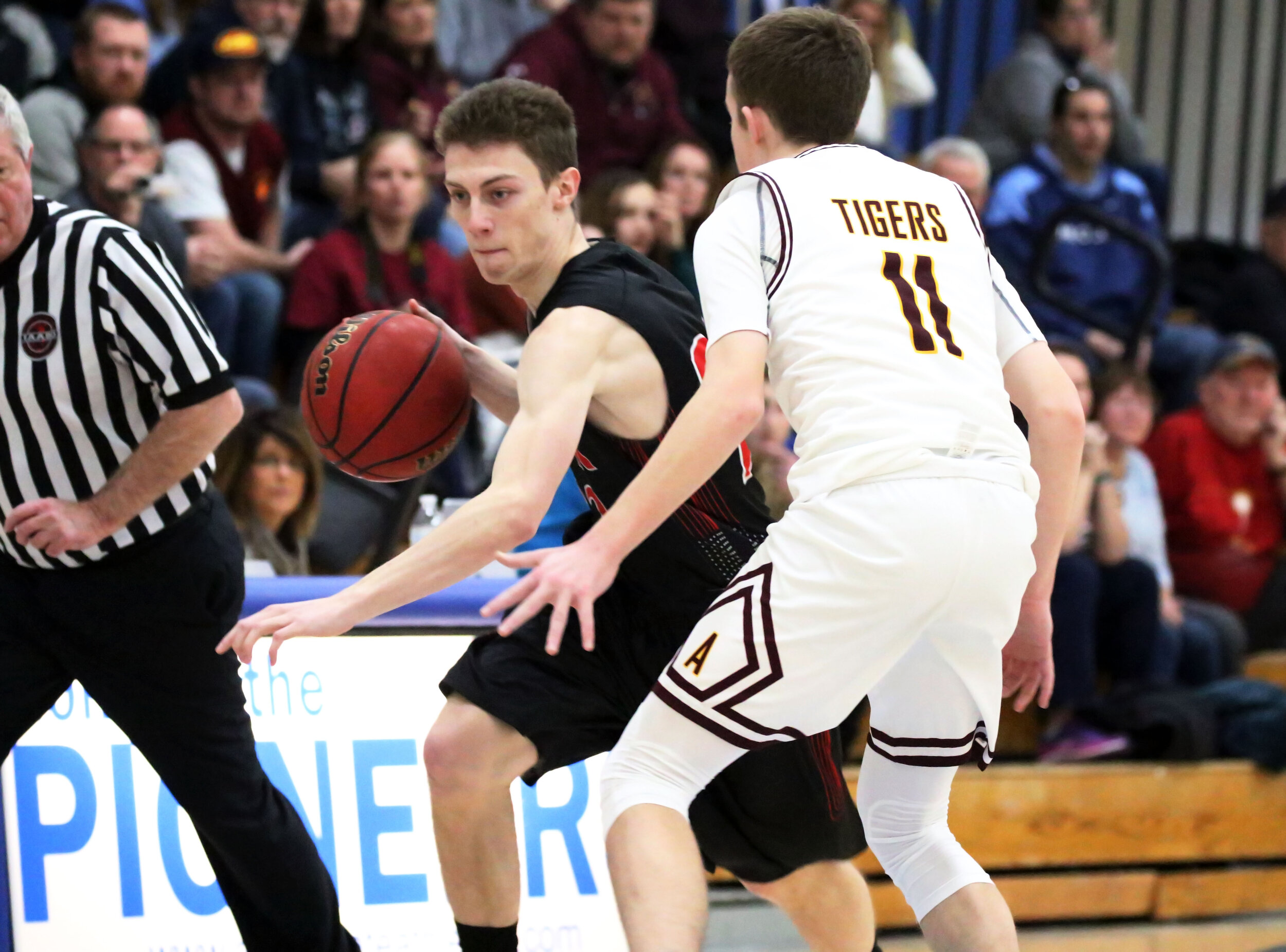  Bolivar-Richburg junior Jason Greeson, off-center, looks to work his way around the Avoca defense down court during game two of the 6th Annual Dan Barkley Showcase at Alfred State College, Saturday evening. [Chris Brooks/WellsvilleSports.com] 